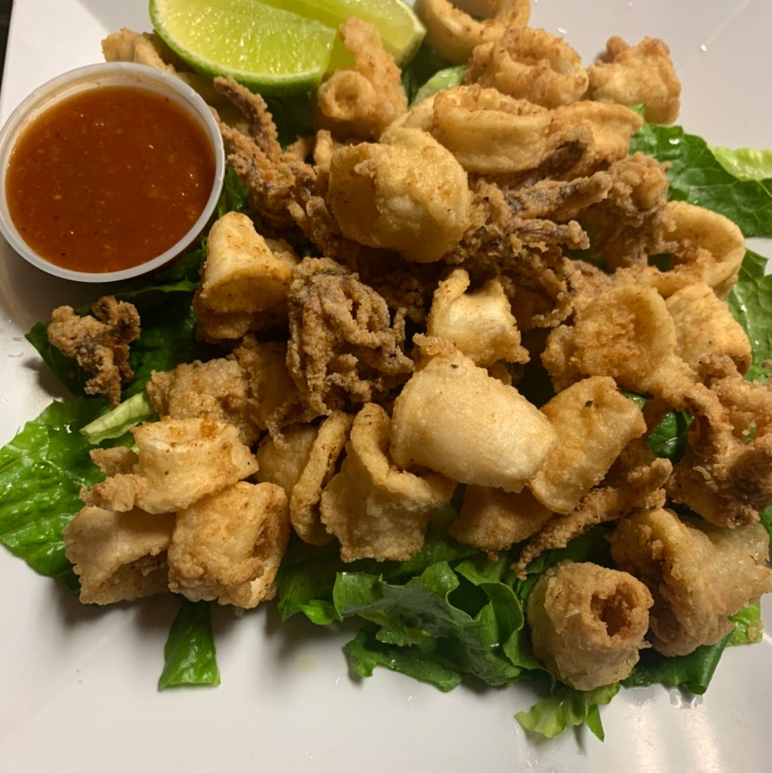 Order Large Fried Calamari - Appetizer food online from Taste of Italy Pizzeria store, Corona on bringmethat.com