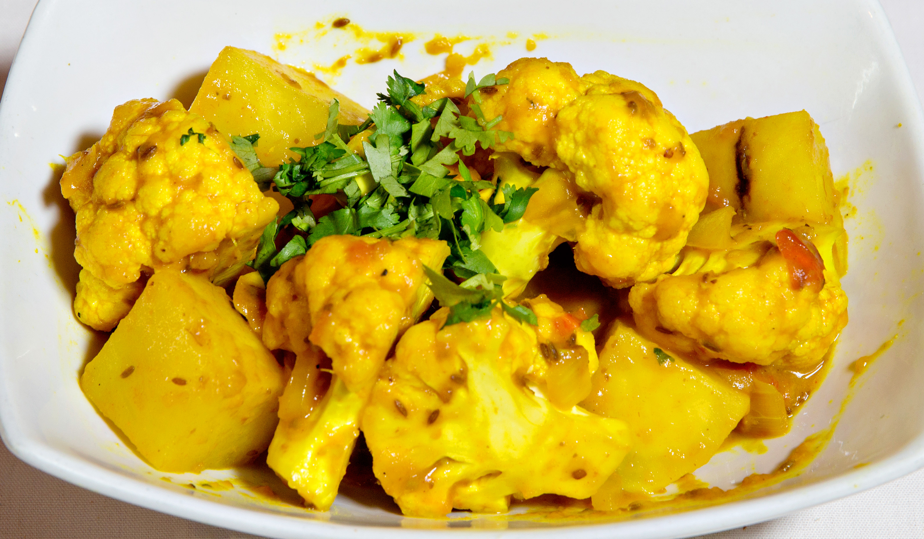 Order Potato Cauliflower food online from Rajput Indian Cuisine store, Suffolk on bringmethat.com