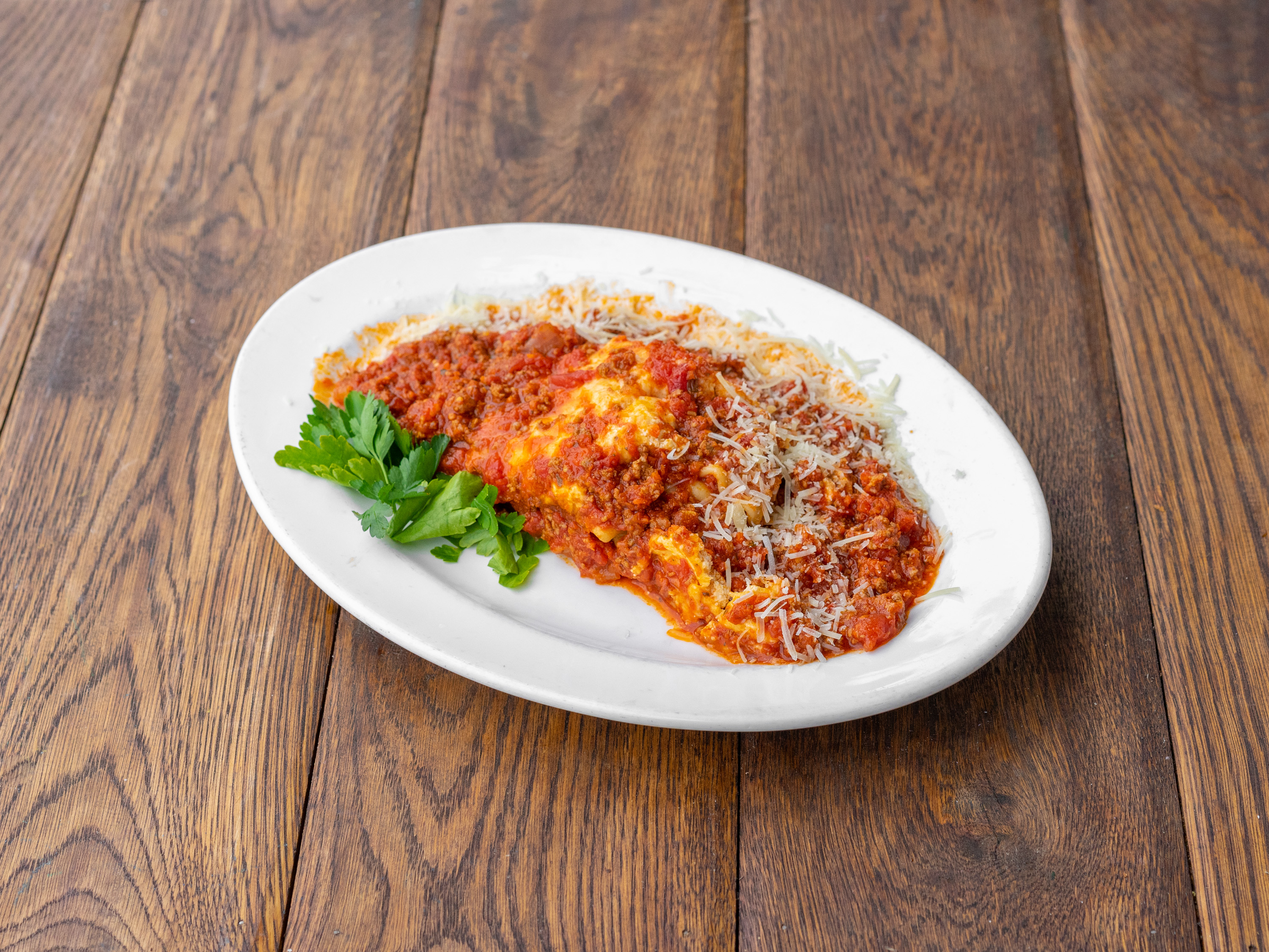 Order Lasagne food online from Allegro Pizzeria store, Carmel-by-the-Sea on bringmethat.com