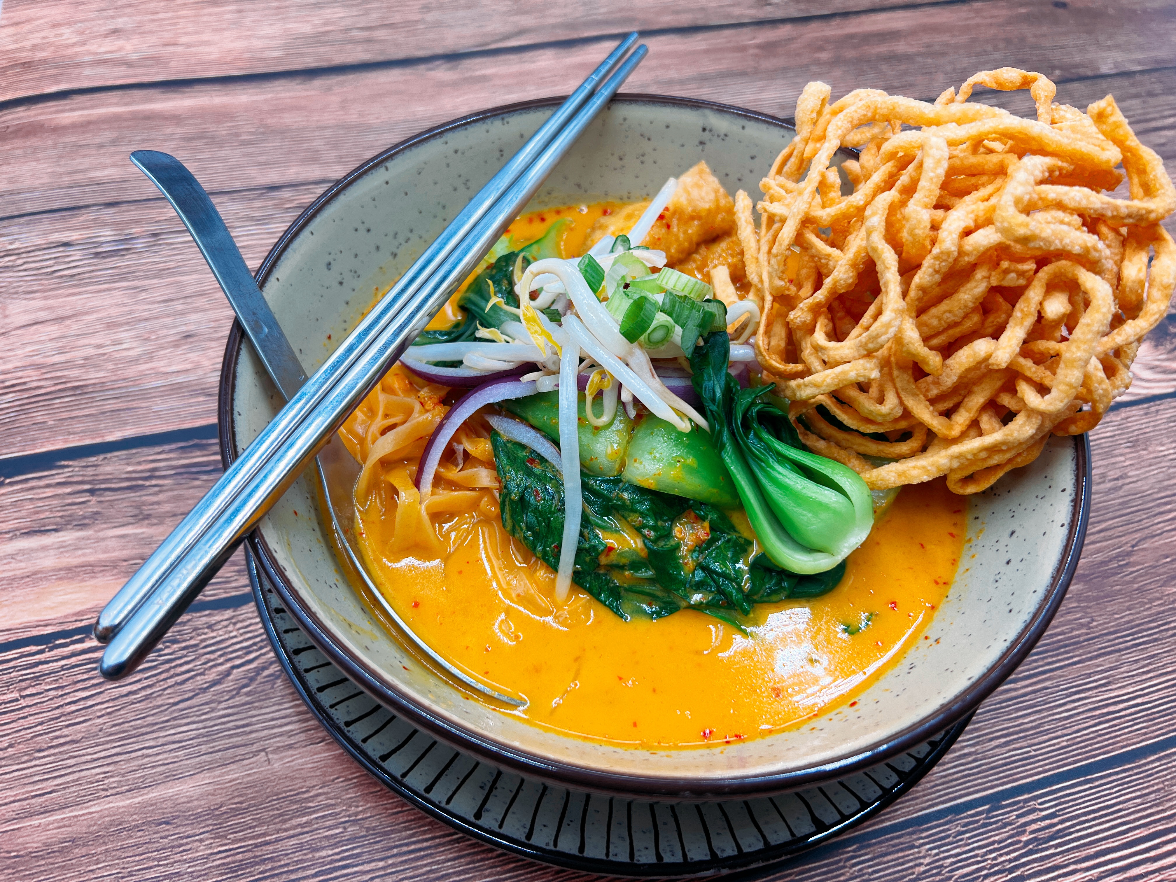 Order Khao Soi (Egg noodle curry) food online from Jai dee store, Brooklyn on bringmethat.com