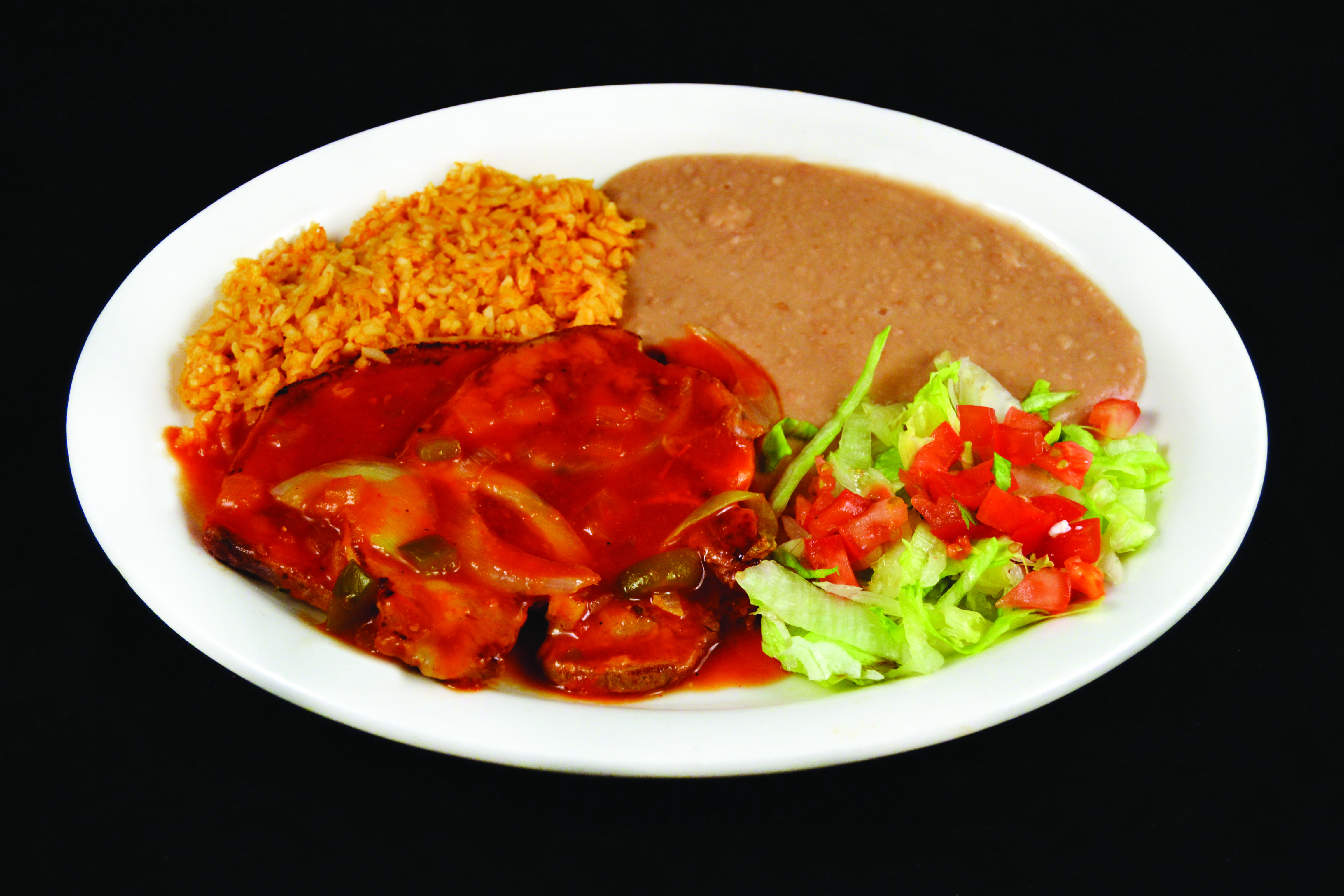 Order Chuletas Rancheras food online from Mi Comal Mexican Restaurant store, Irving on bringmethat.com