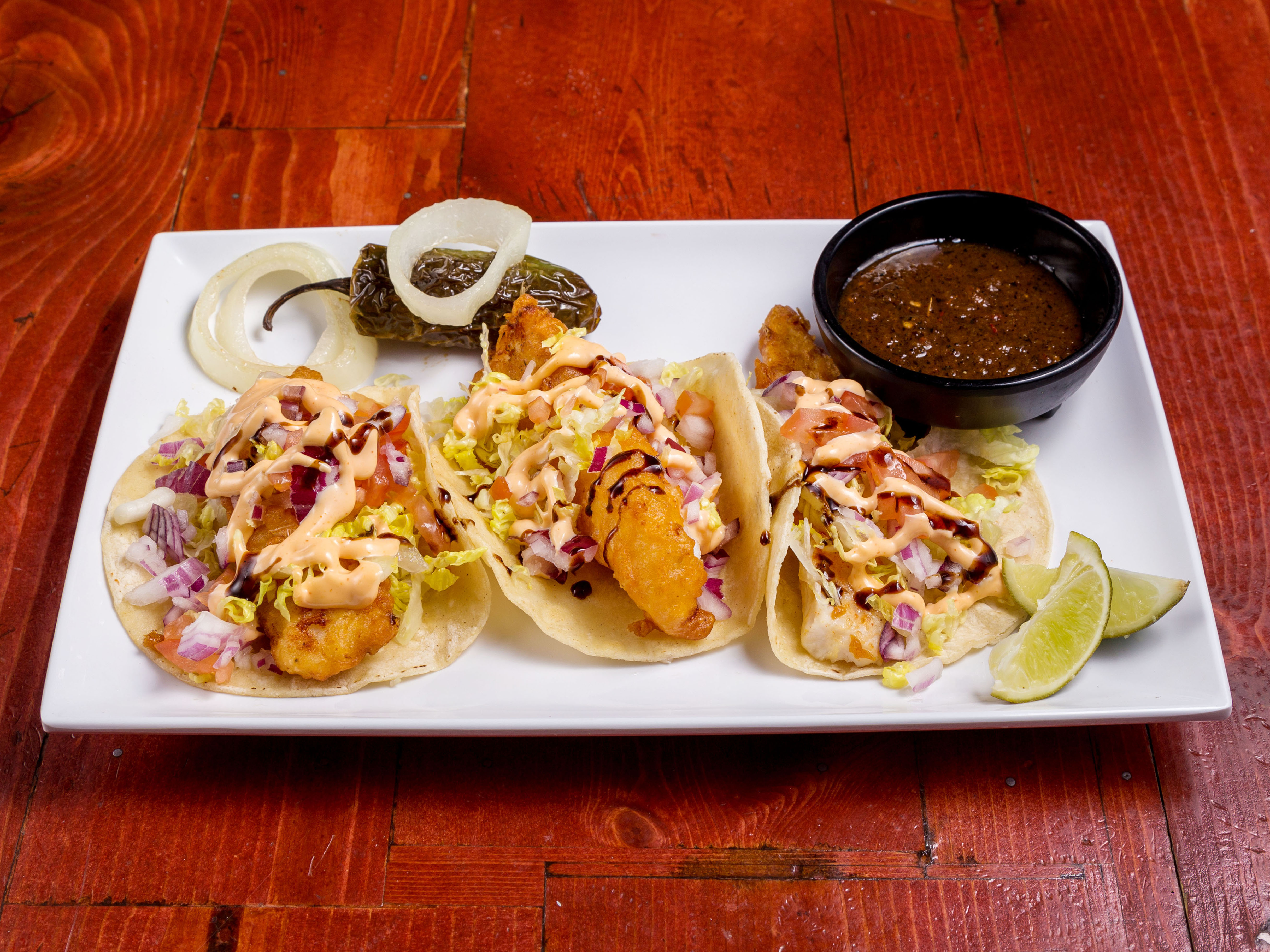 Order 3 Fish Tacos food online from Oasis Crossroads Bar & Grill store, Phoenix on bringmethat.com