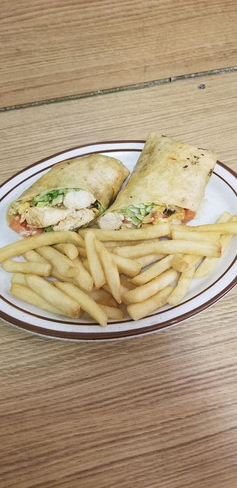 Order Grilled Chicken Caesar Wrap - Wrap food online from Sal Pizza store, Mt Holly on bringmethat.com