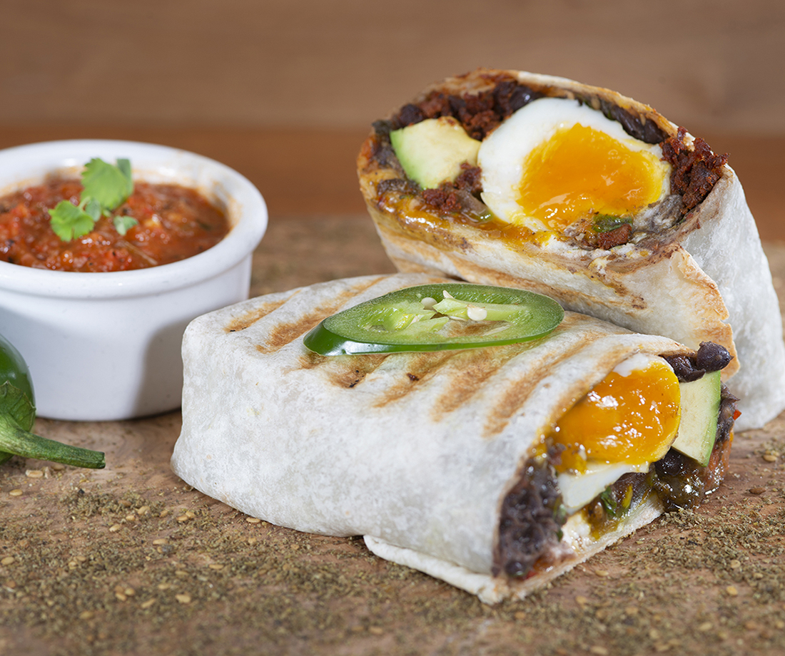 Order Huevos Rancheros Burrito food online from Urth Caffe store, Orange on bringmethat.com