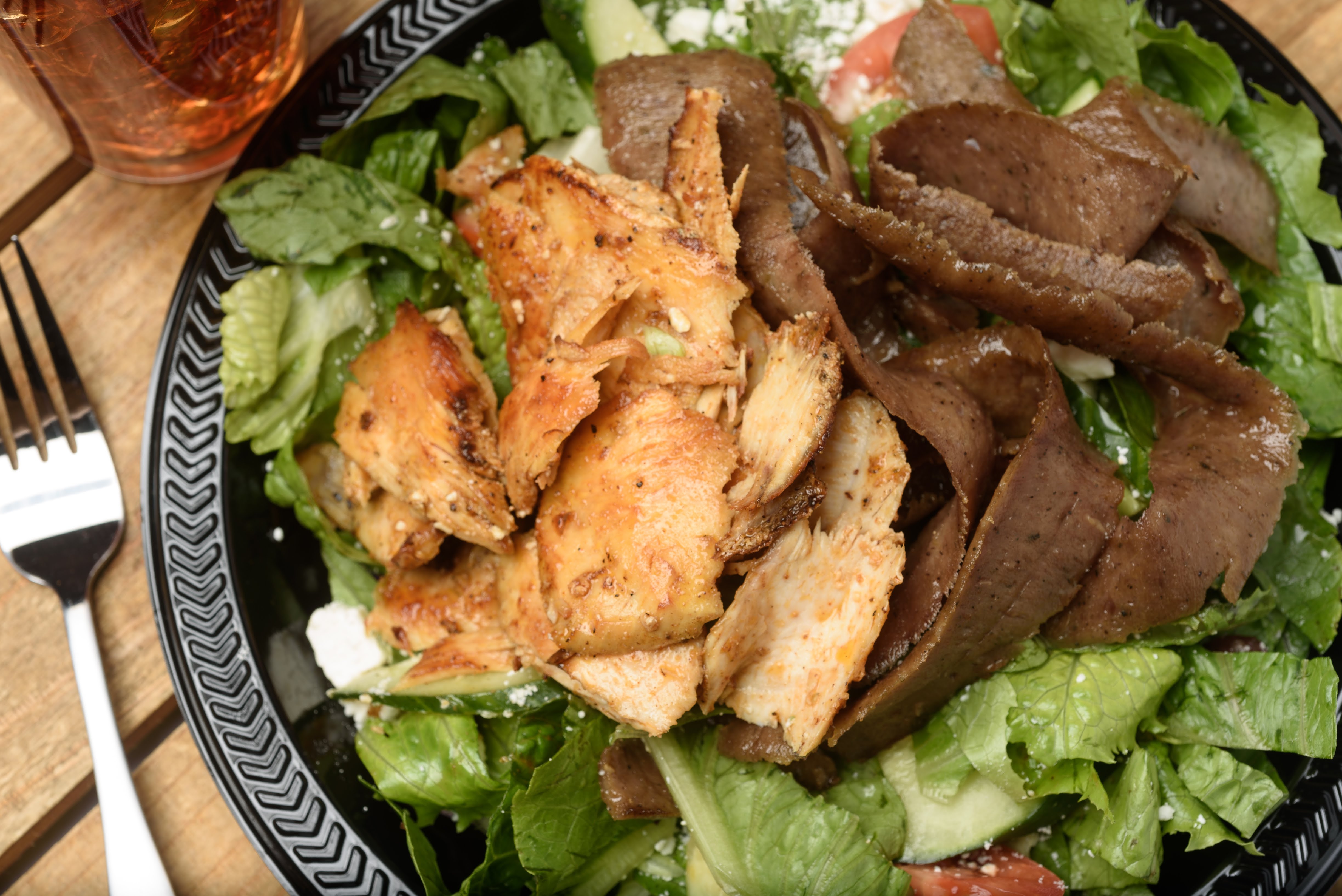 Order Greek Salad with Gyro & Chicken food online from Zorbas store, Youngsville on bringmethat.com