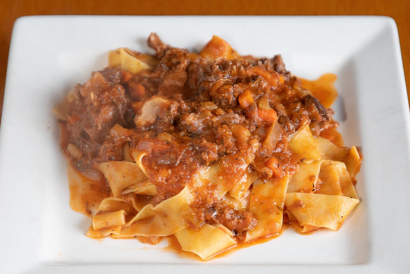 Order Pappardelle with Ox-Tail ragu’ food online from Trattoria da Vittorio store, San Francisco on bringmethat.com