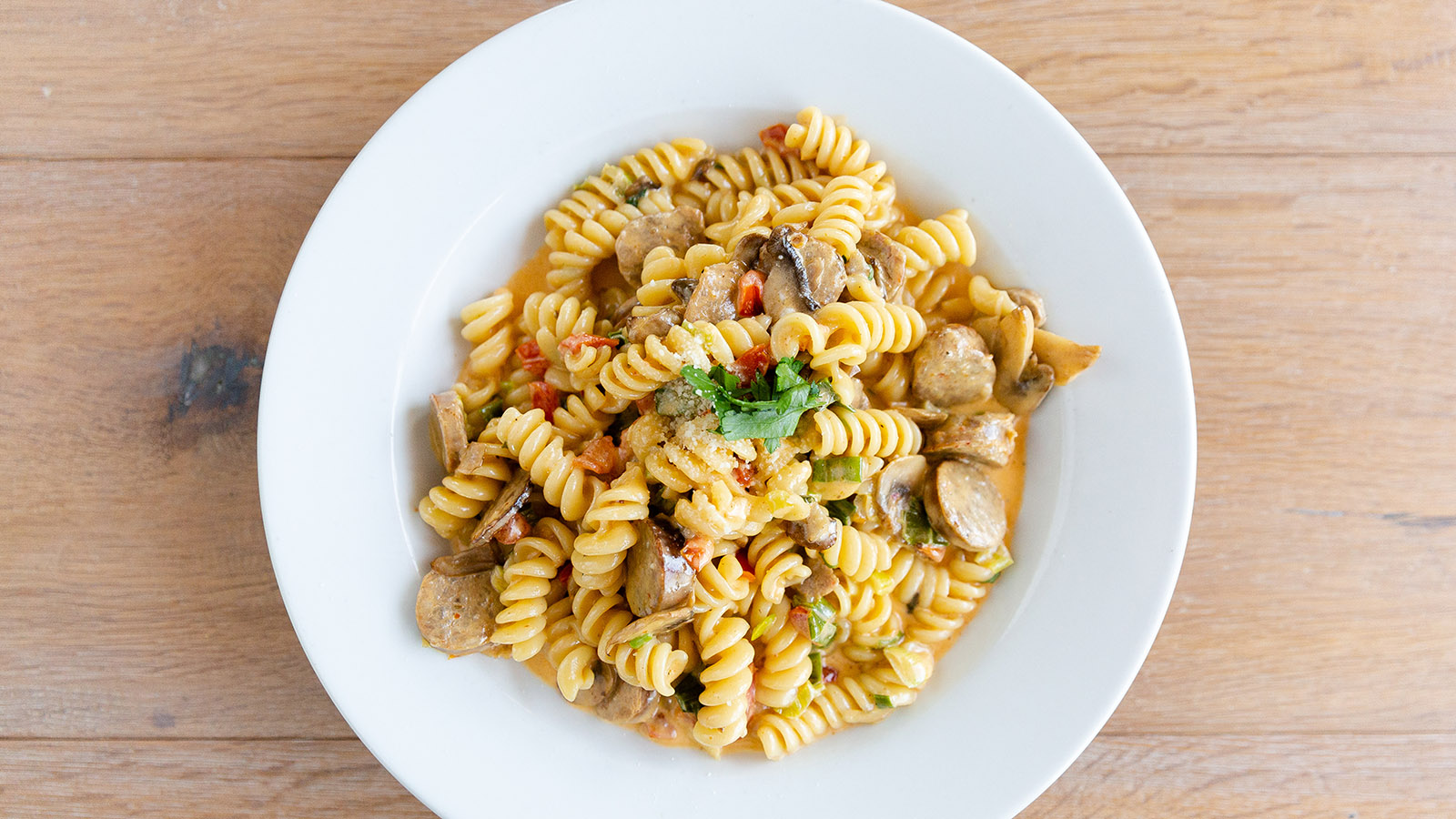 Order Spicy Alfredo with Italian Sausage food online from Babbo Italian Eatery store, Phoenix on bringmethat.com