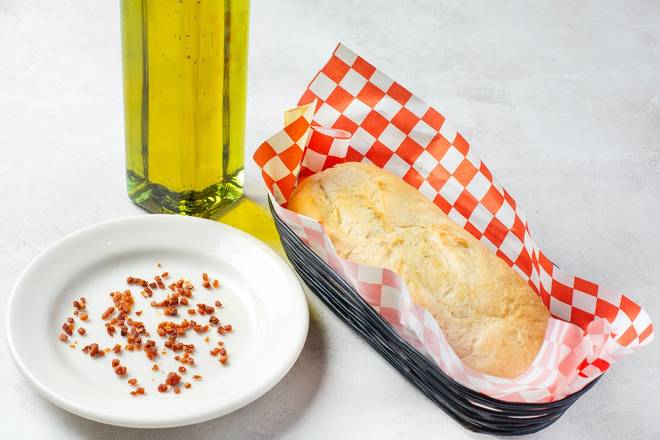 Order ADD ADDITIONAL BREAD (TWO HALF LOAVES) food online from Johnny Carinos Italian Restaurant store, Oklahoma City on bringmethat.com