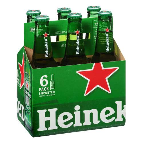 Order Heineken · Dutch Premium Lager Beer (6 x 12 fl oz) bottles  food online from D & B Liquor store, Olmos Park on bringmethat.com