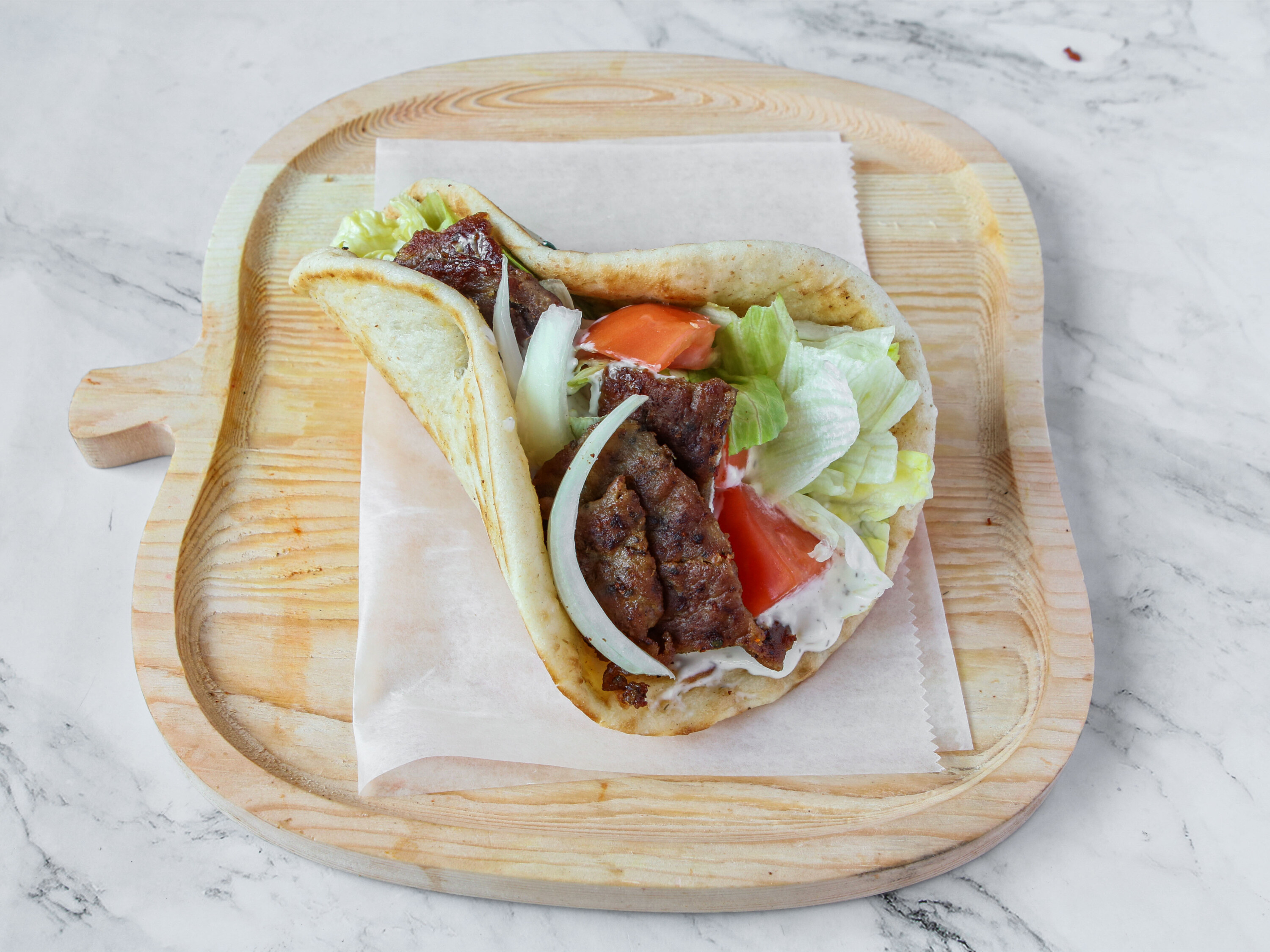 Order 10. Lamb Gyro on Pita Sandwich food online from New York Plater store, Fall River on bringmethat.com