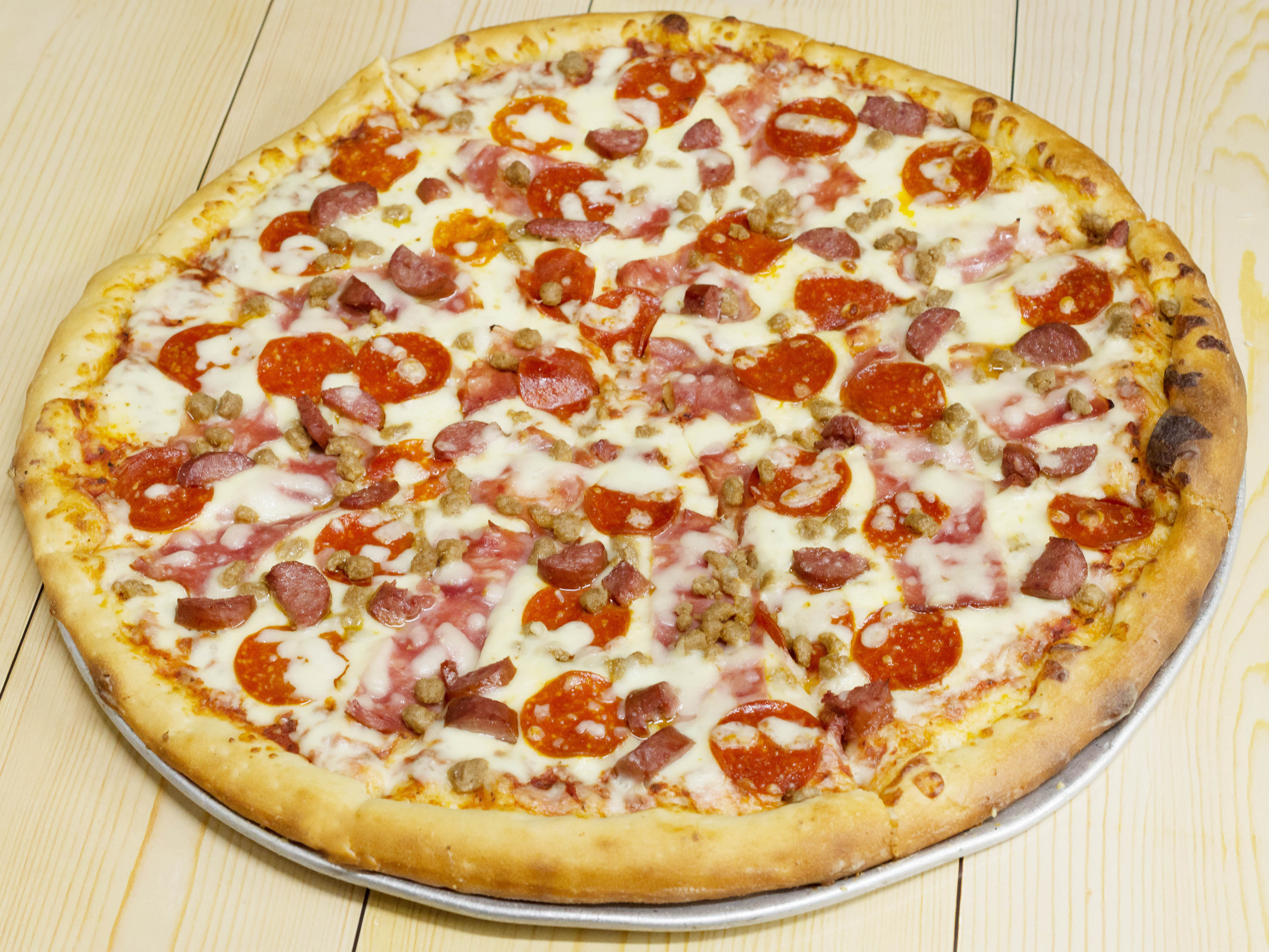 Order Meat lover Pizza food online from Hopkins Store store, Richmond on bringmethat.com