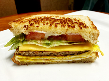 Order 8. Bacon, Sausage OR Ham with Egg Sandwich food online from Garden Deli store, Garden Grove on bringmethat.com