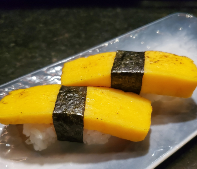 Order Egg omelet(Tamago) nigiri food online from Iron Fish Sushi & Grill store, Pflugerville on bringmethat.com