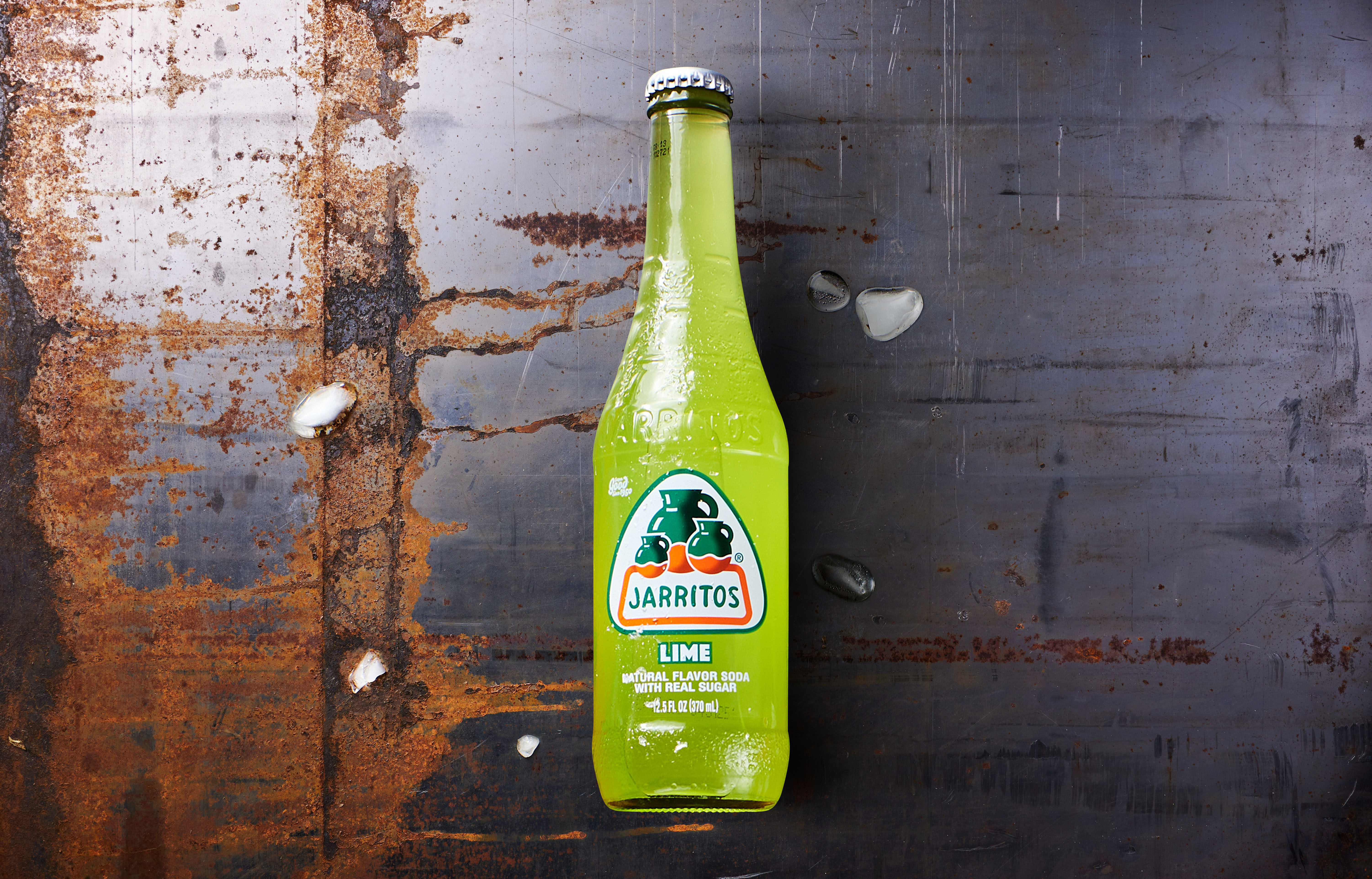Order Jarritos Mexican Limón Soda food online from George Lopez Tacos store, Ann Arbor on bringmethat.com