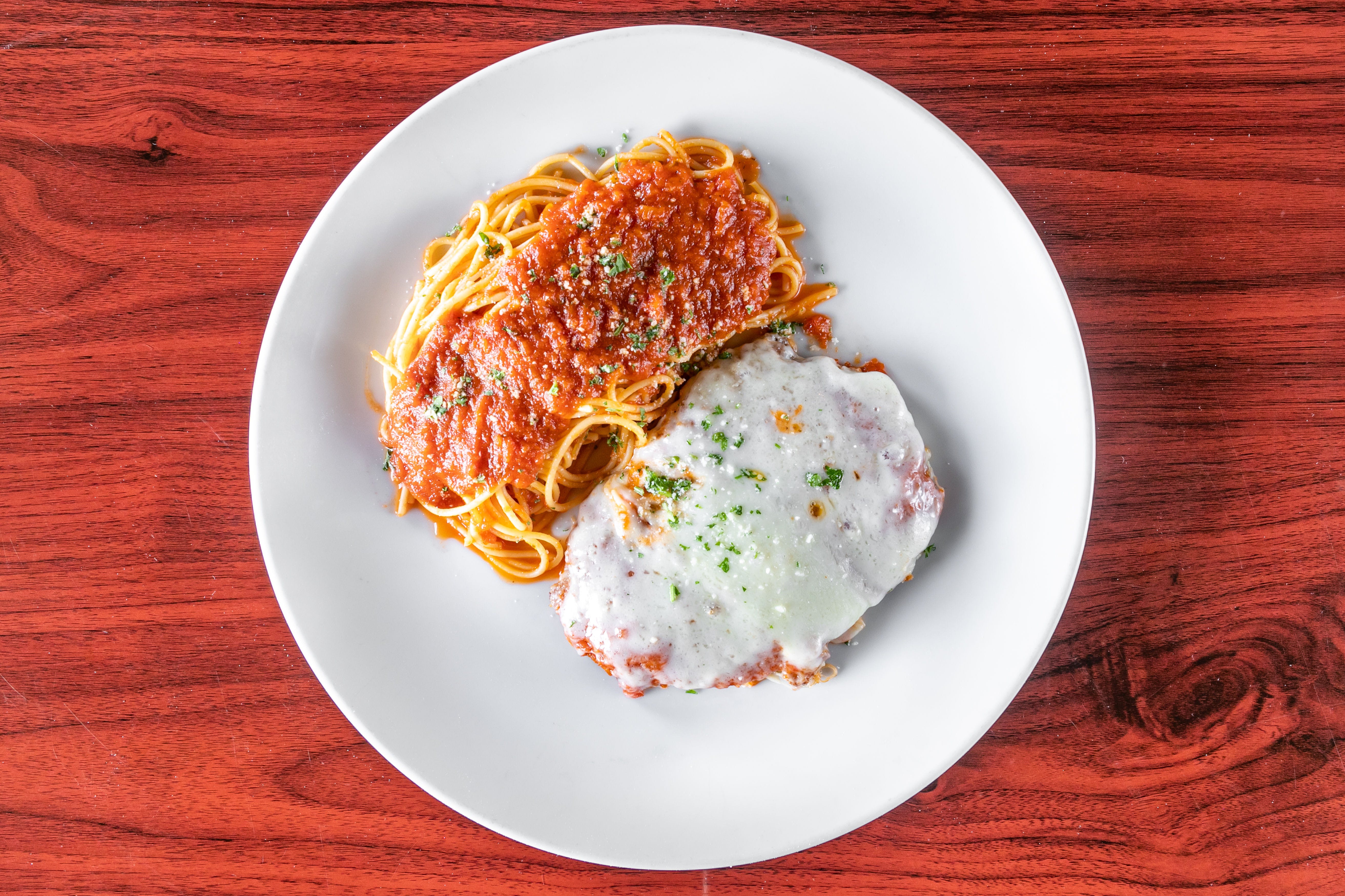Order Chicken Parmigiana - Entree food online from Bellissimo store, Colleyville on bringmethat.com