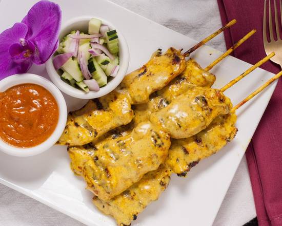 Order 1. Chicken Satay (house Specialty) food online from Oros Thai Restaurant store, San Jose on bringmethat.com