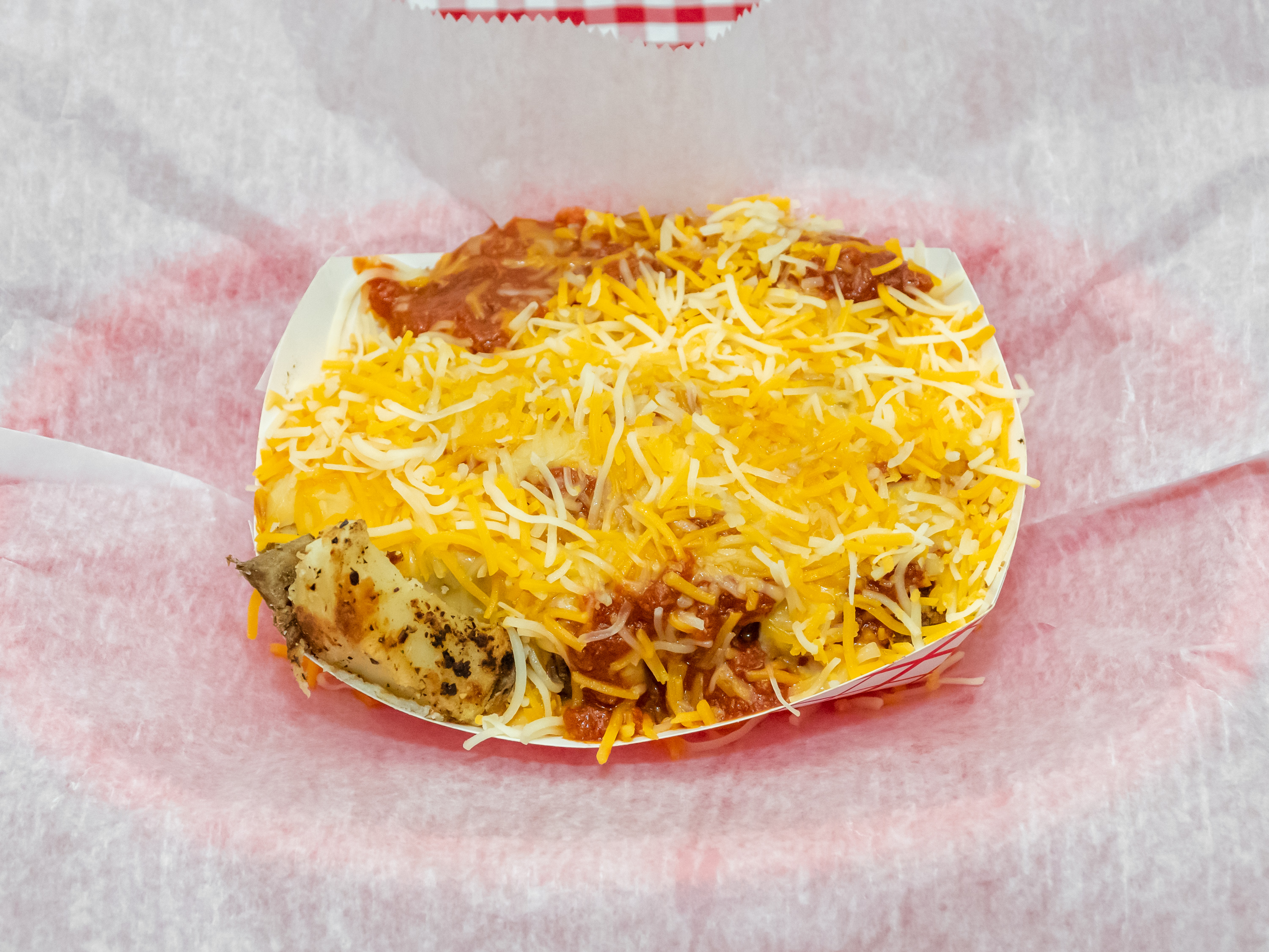 Order Chili Cheese Tators food online from Get It On A Bun At Bootys store, New Albany on bringmethat.com