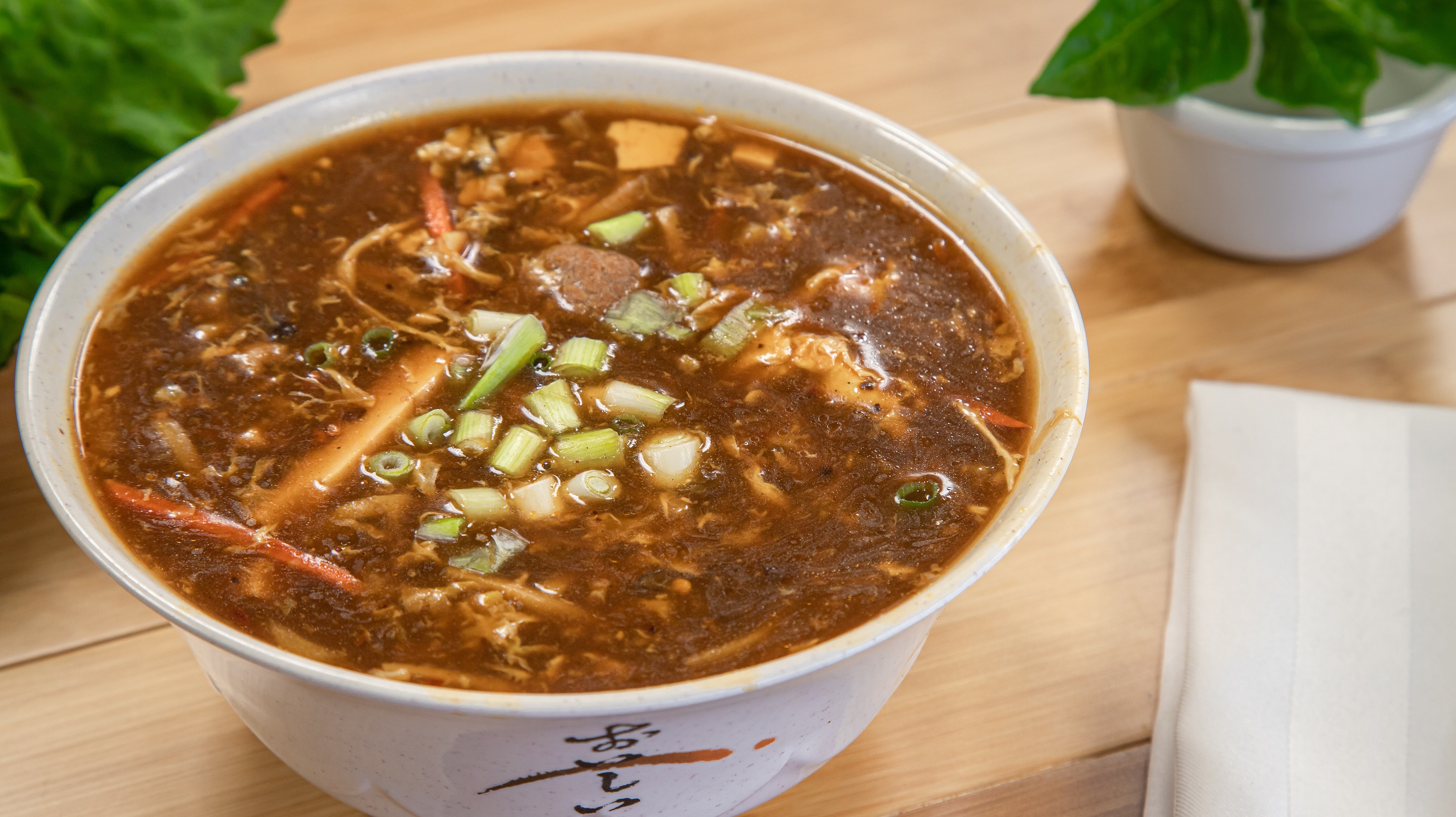 Order 12. Hot & Sour Soup food online from Pho Cafe Hong Kong Diner store, Reno on bringmethat.com