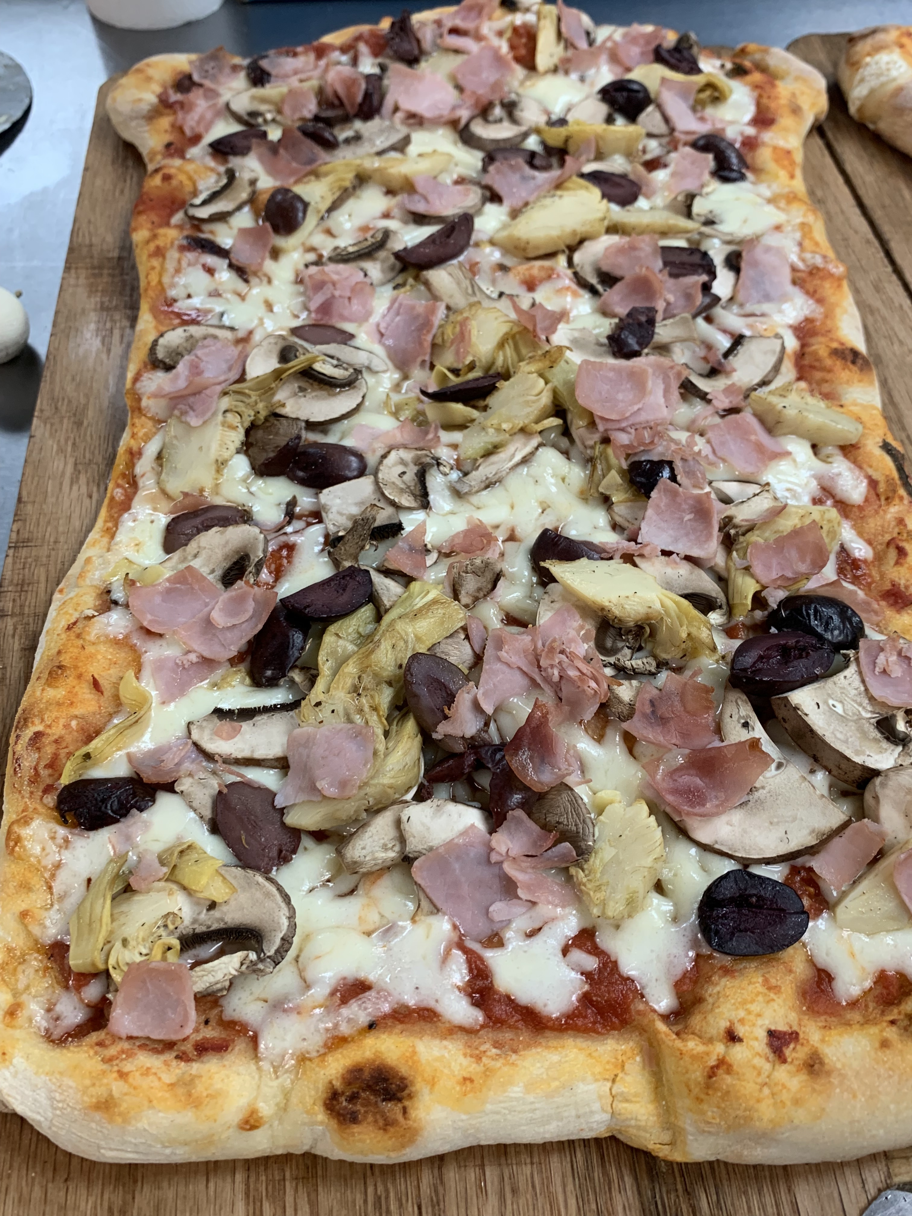 Order Pizza Capricciosa with Italian ham food online from Il Baretto store, New York on bringmethat.com