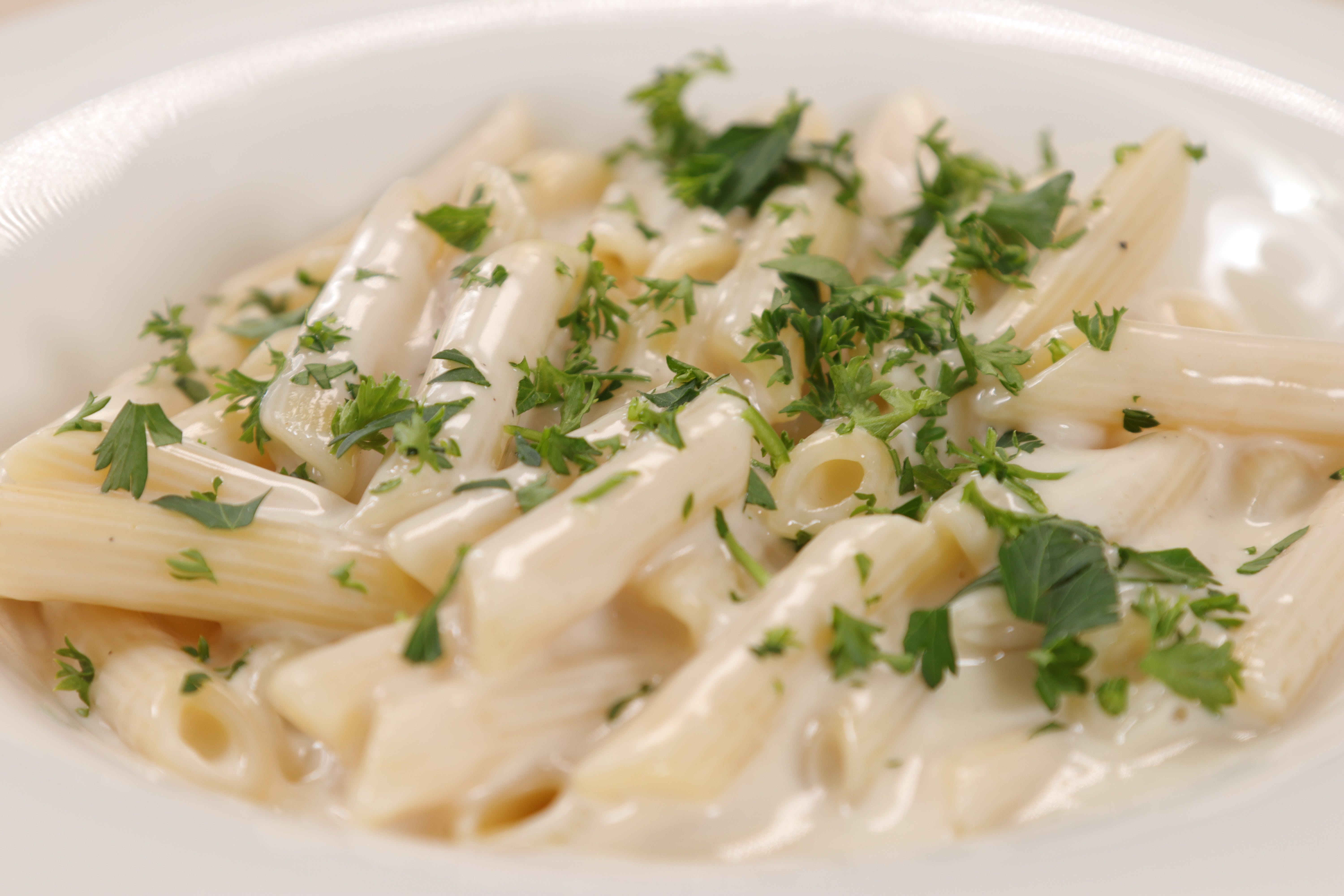 Order Pasta with Alfredo Sauce - Pasta food online from Ameci Pizza & Pasta store, Westlake Village on bringmethat.com