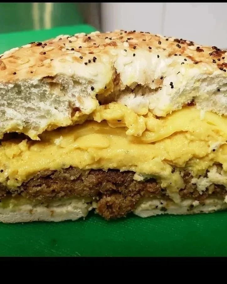 Order Vegan Bagel Sandwich with Tots - Breakfast food online from Kahiau Bakery & Cafe store, Virginia Beach on bringmethat.com