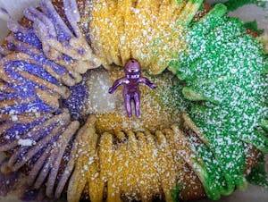 Order Mini King Cake food online from Dusty Biscuit Beignets store, Fort Worth on bringmethat.com