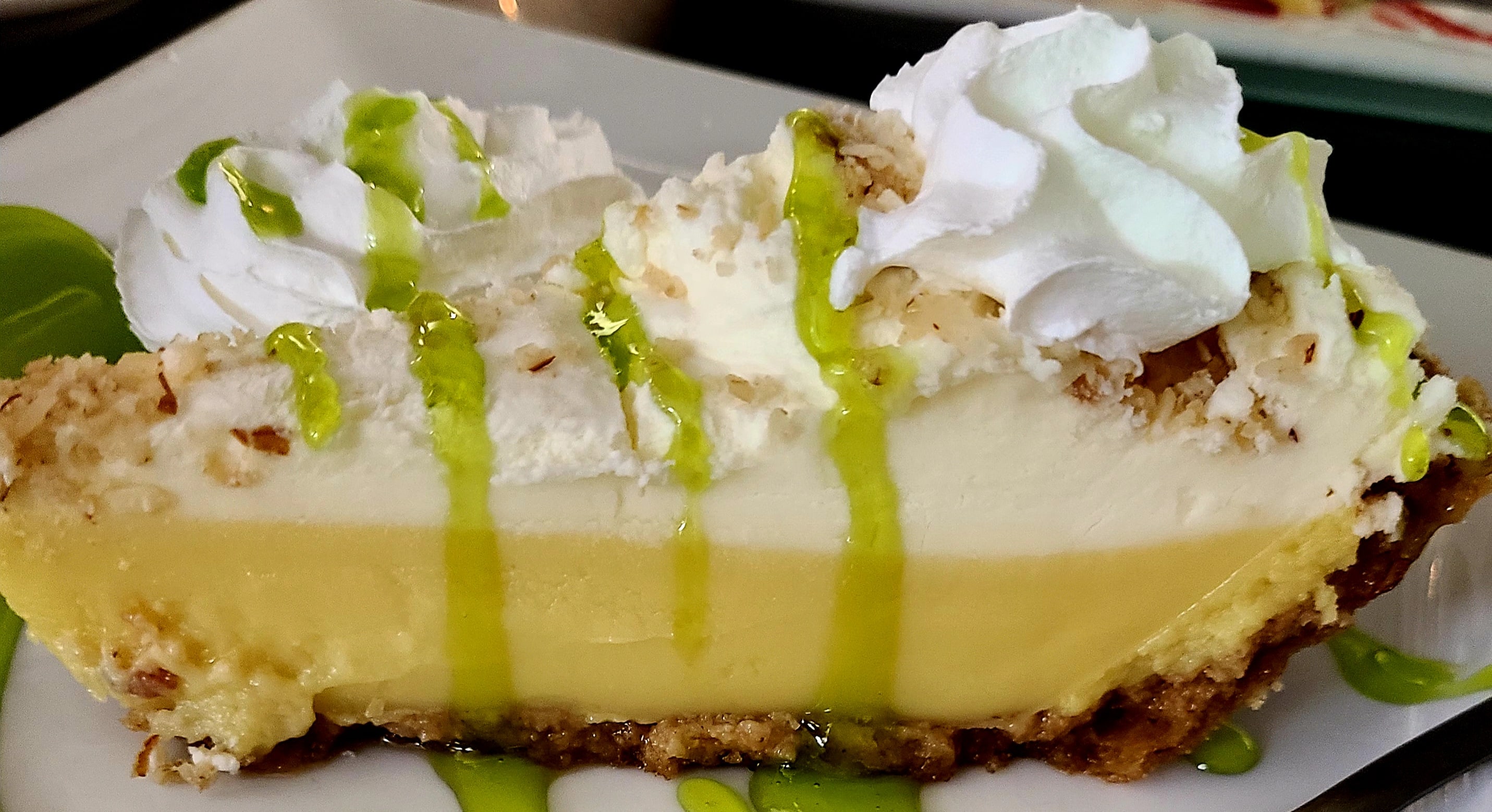 Order Key Lime Pie food online from Tavern on the Bay at Harrison's Landing store, Corpus Christi on bringmethat.com