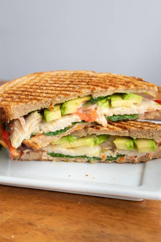 Order Turkey Panini food online from The Source Cafe store, Hermosa Beach on bringmethat.com