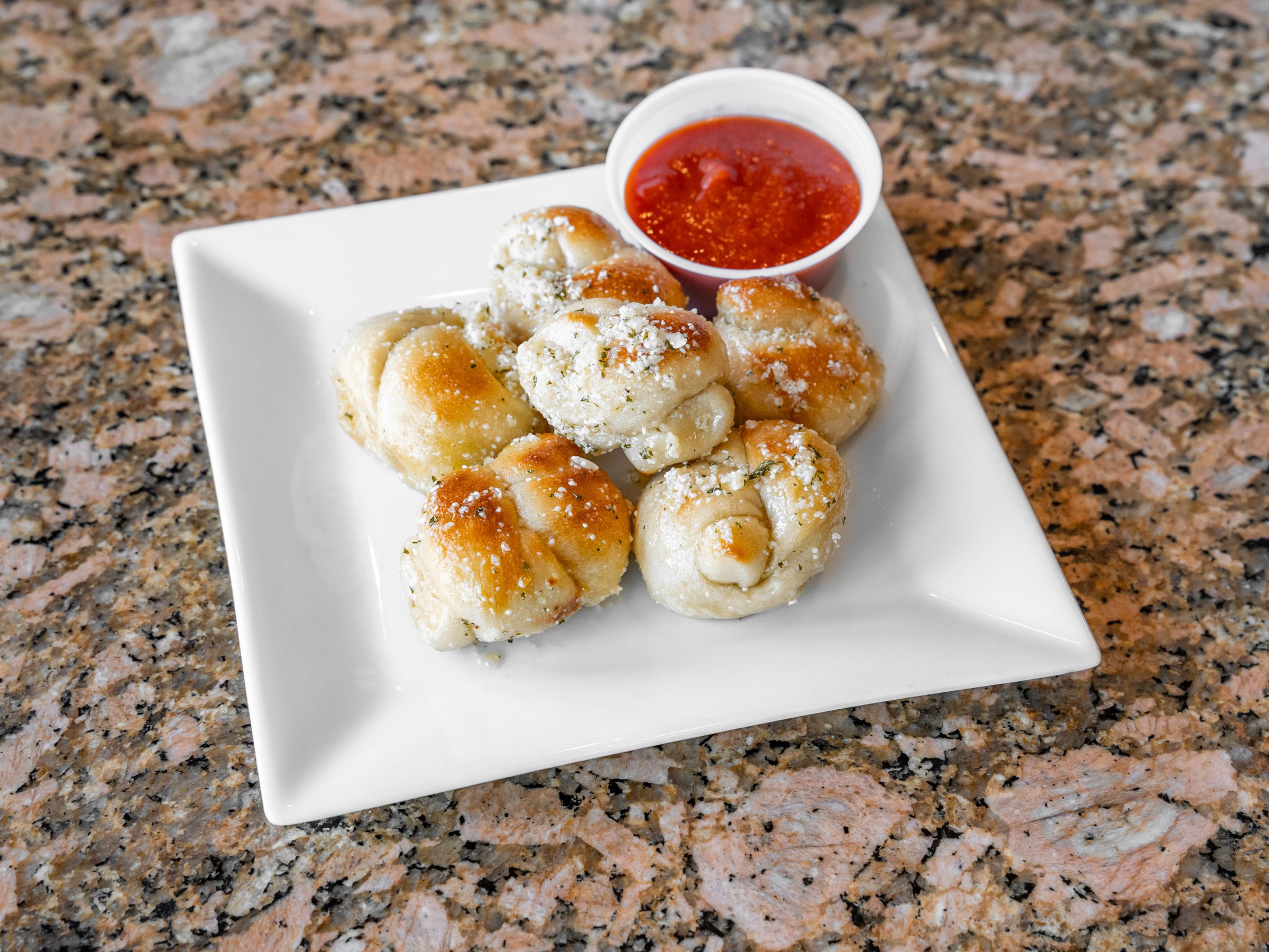 Order Garlic Knots food online from Camilas Pizzeria Iv store, Morrisville on bringmethat.com