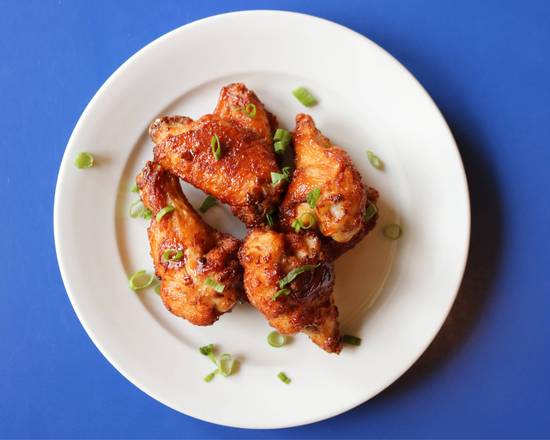 Order Sticky Wings food online from Reginelli's Pizzeria store, New Orleans on bringmethat.com