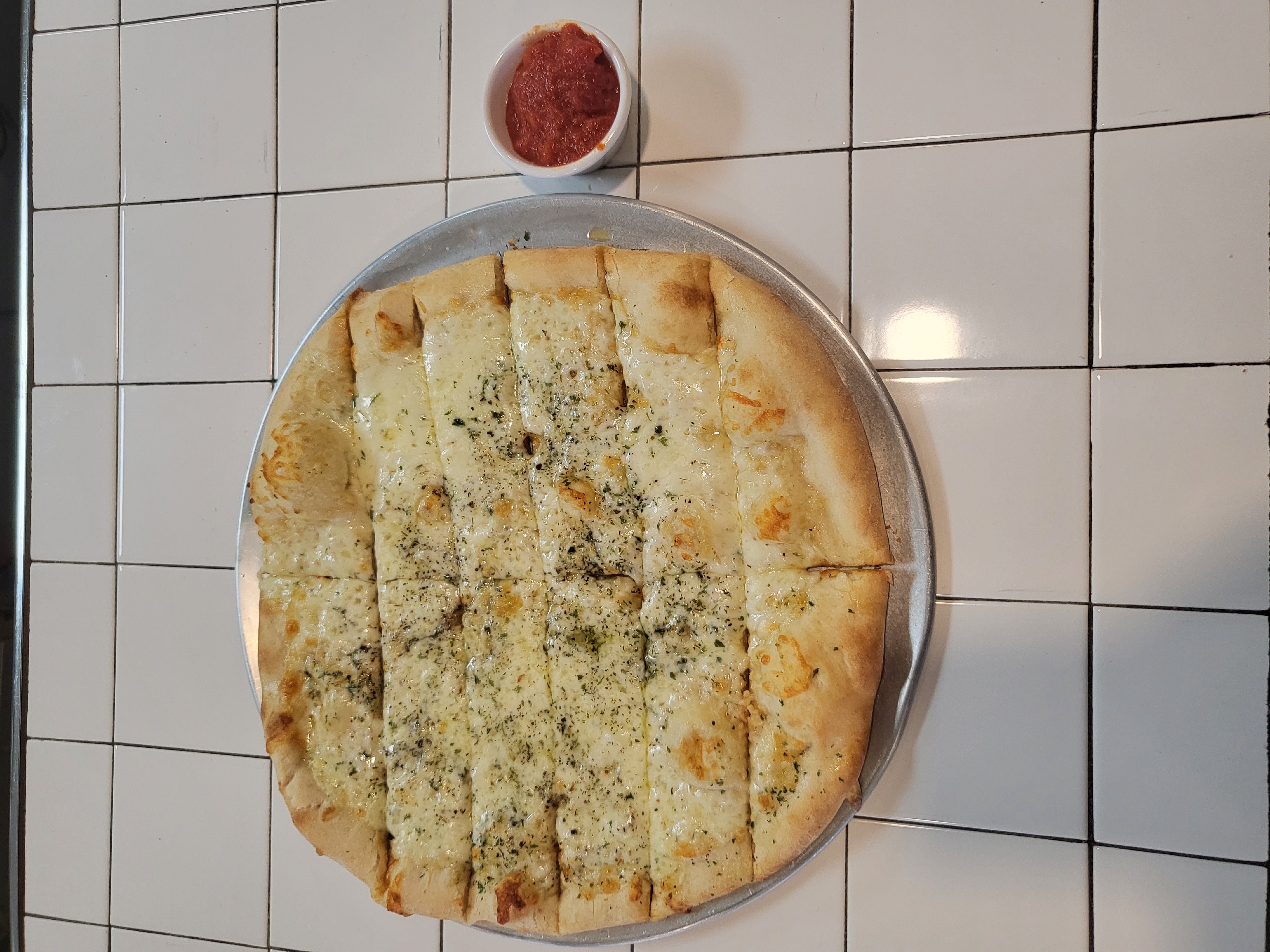 Order Cheesy garlic bread sticks food online from La Trattoria Pizzeria store, Hagerstown on bringmethat.com