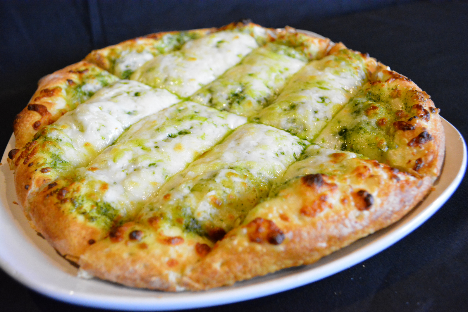 Order PESTO STICKS food online from Stuft Pizza store, Milpitas on bringmethat.com
