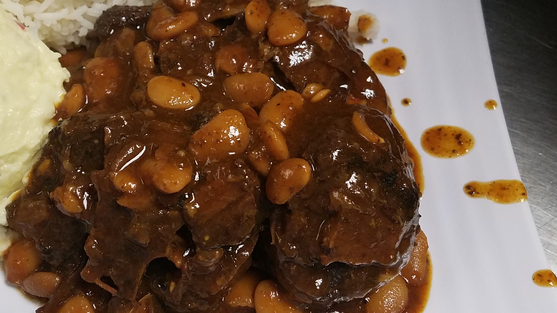 Order Extra Portion of Oxtail ＆amp; Beans* food online from Jamaican Jerk & Bbq store, Denver on bringmethat.com