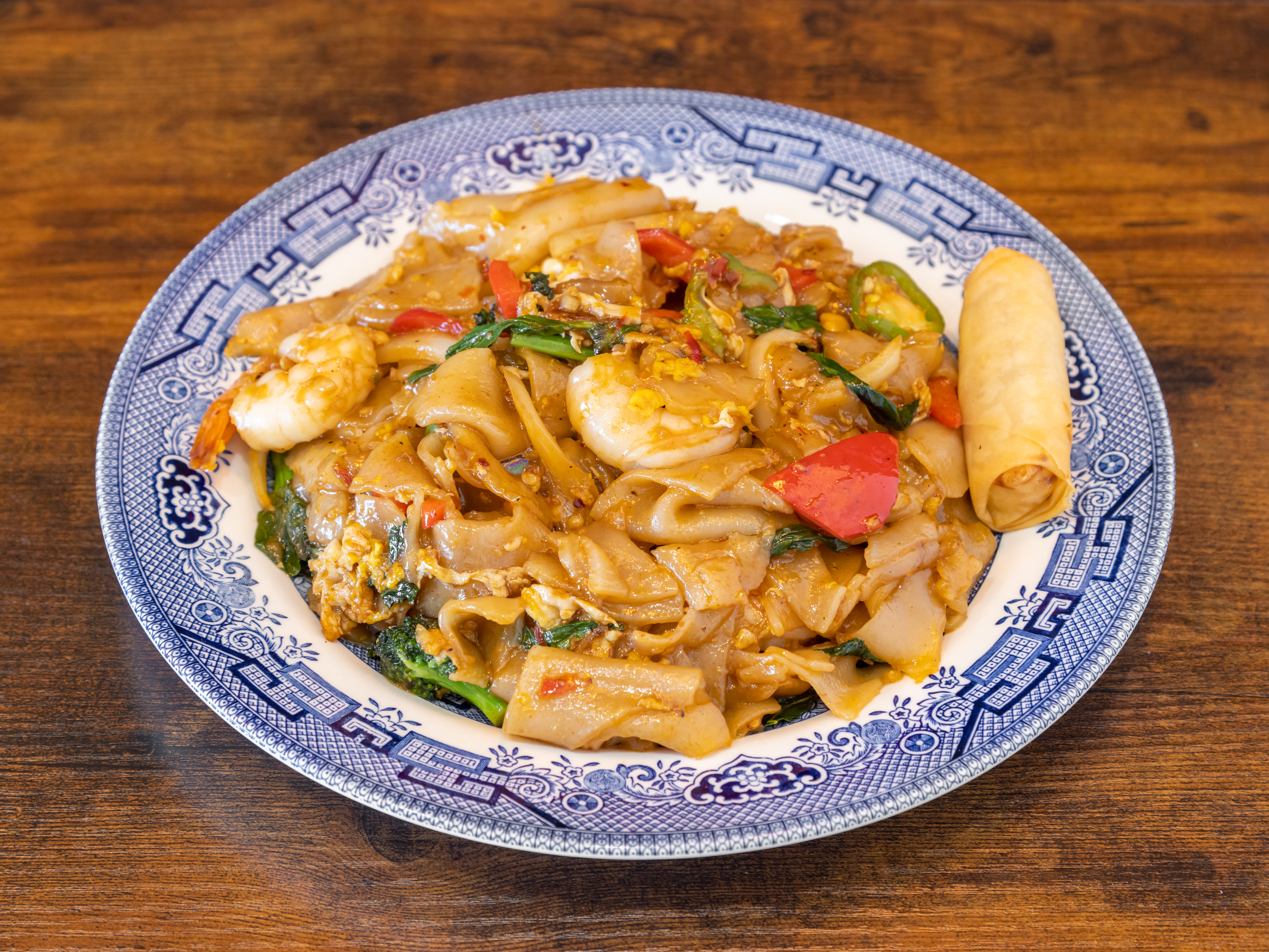 Order Drunken Noodle food online from Thai Cookery store, Hawthorne on bringmethat.com