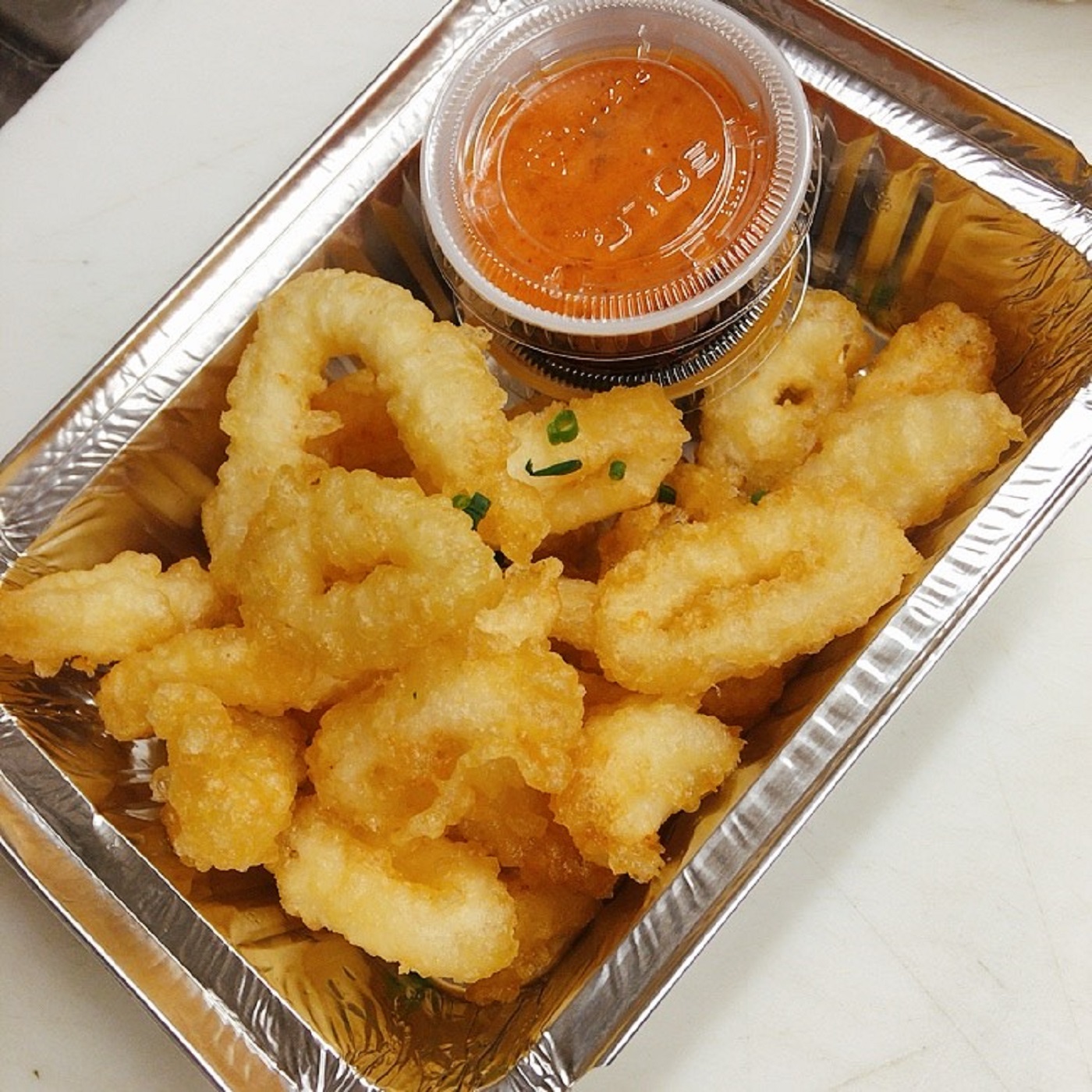 Order Crispy Calamari food online from Rice And Curry store, Ambler on bringmethat.com