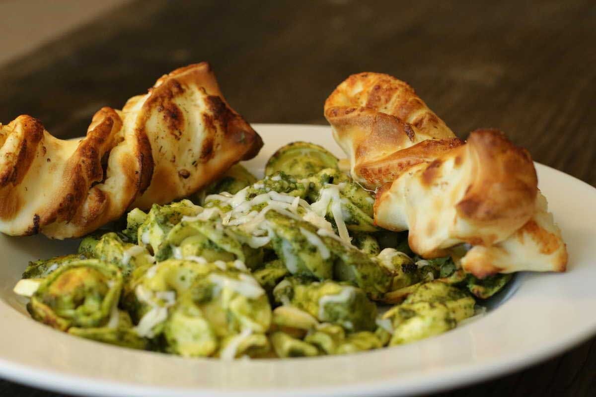 Order Pesto Tortellini - Individual food online from Straw Hat Pizza Grille store, Milpitas on bringmethat.com