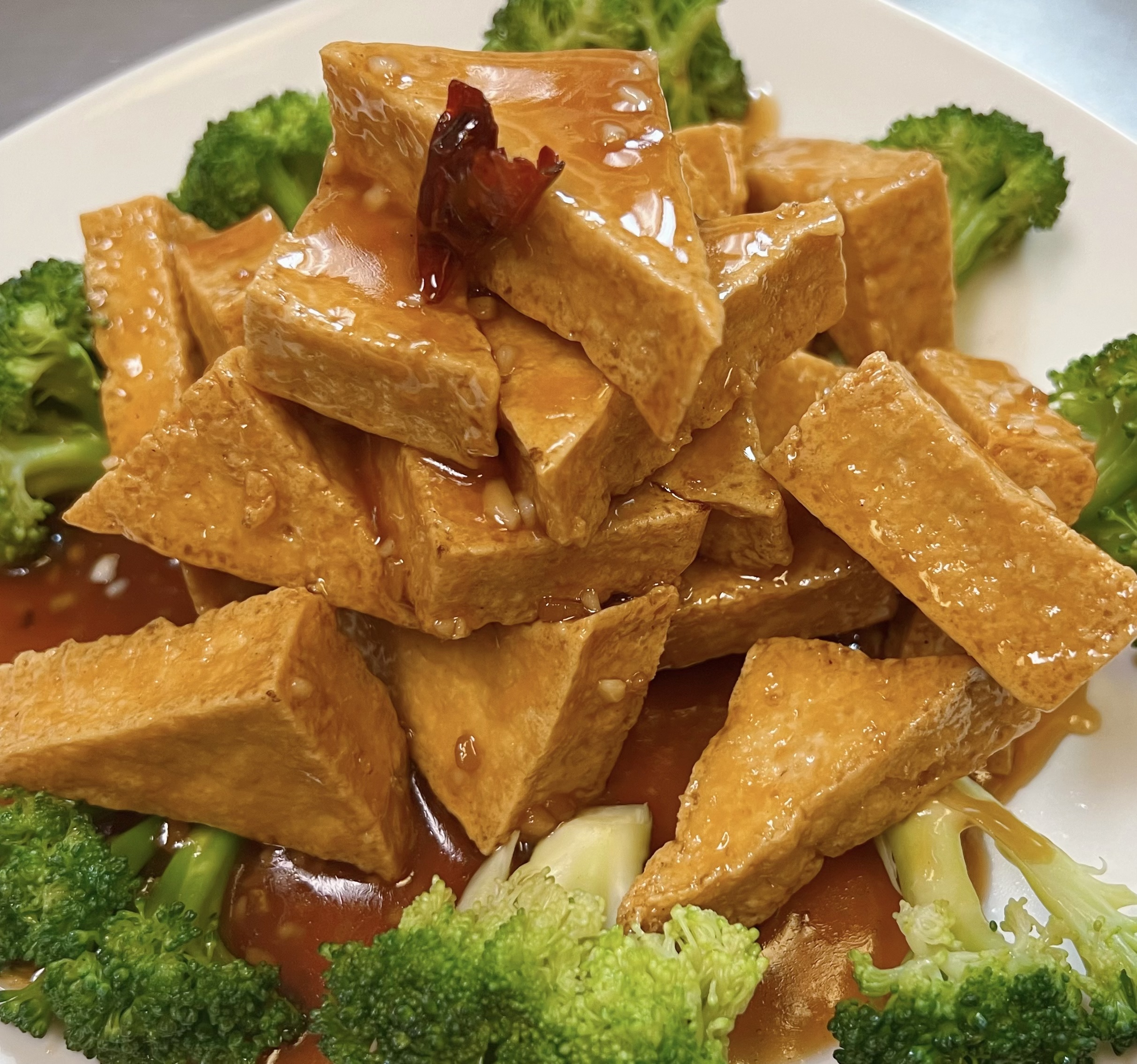 Order Fried Tofu with Hot Braised Sauce on Top Broccoli food online from Hunan Express store, Ballwin on bringmethat.com