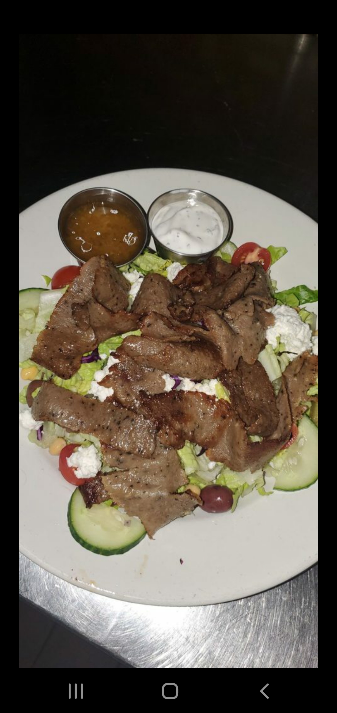 Order Greek Salad with choice of protein food online from Pita On The Plaza store, Bethesda on bringmethat.com