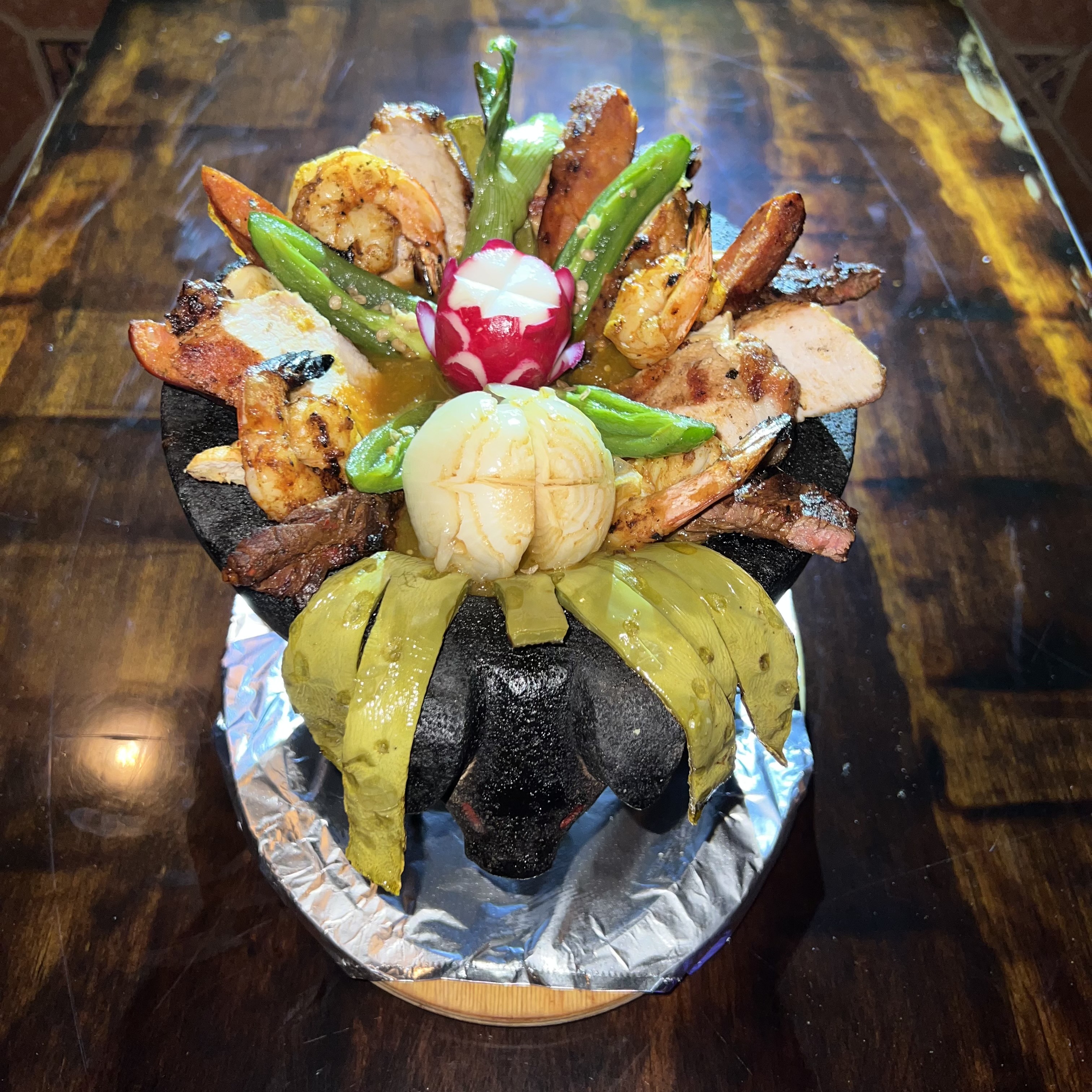 Order Molcajete Supreme food online from Noches Mexicanas store, Bronx on bringmethat.com