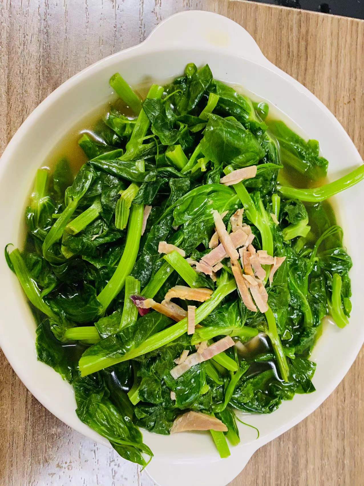 Order Snow Pea Leaves in Supreme Broth 上湯大豆苗 food online from Dim Sum Club store, San Francisco on bringmethat.com