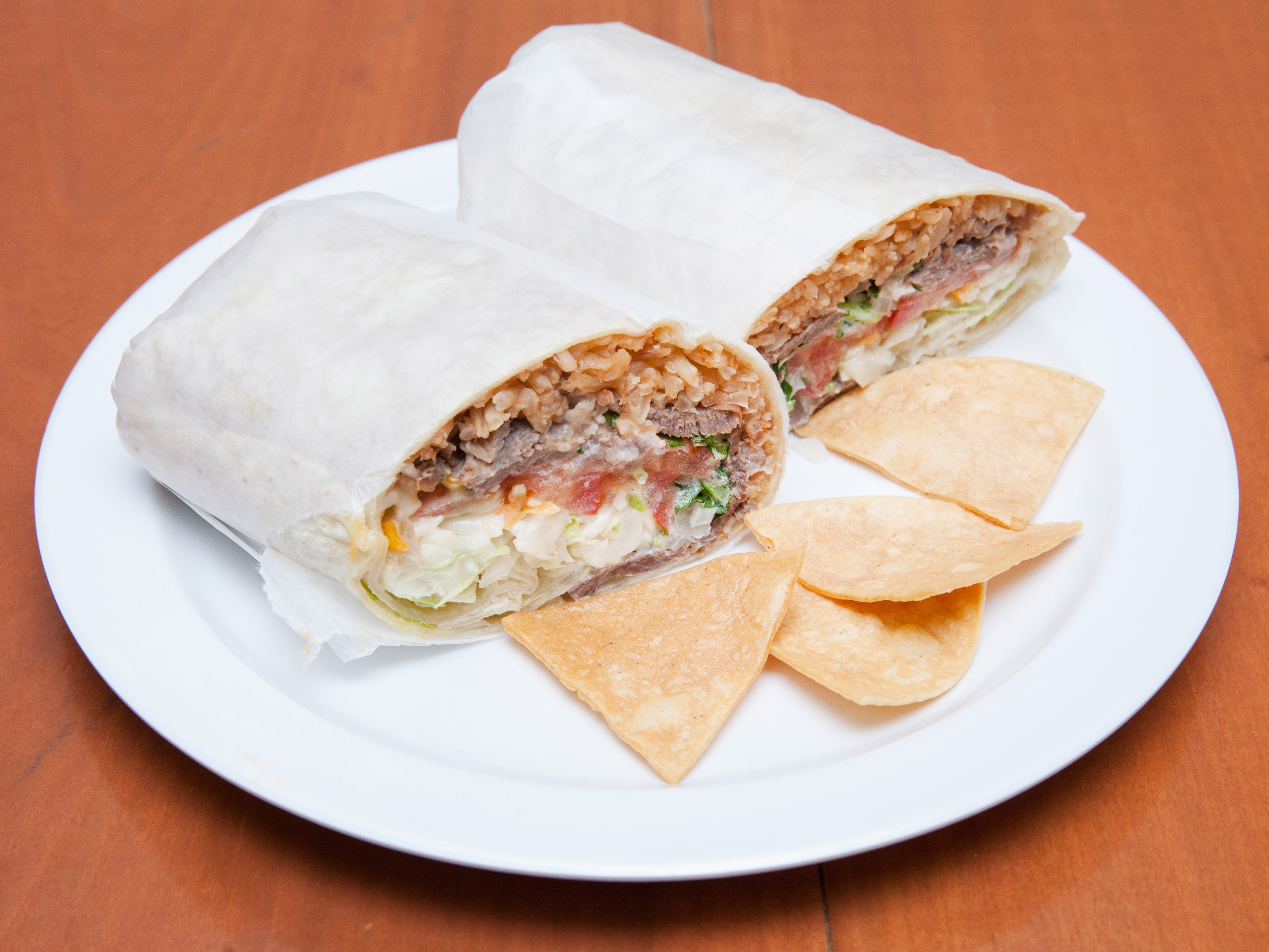 Order Bistek Burrito food online from Los portales store, Long Island City on bringmethat.com