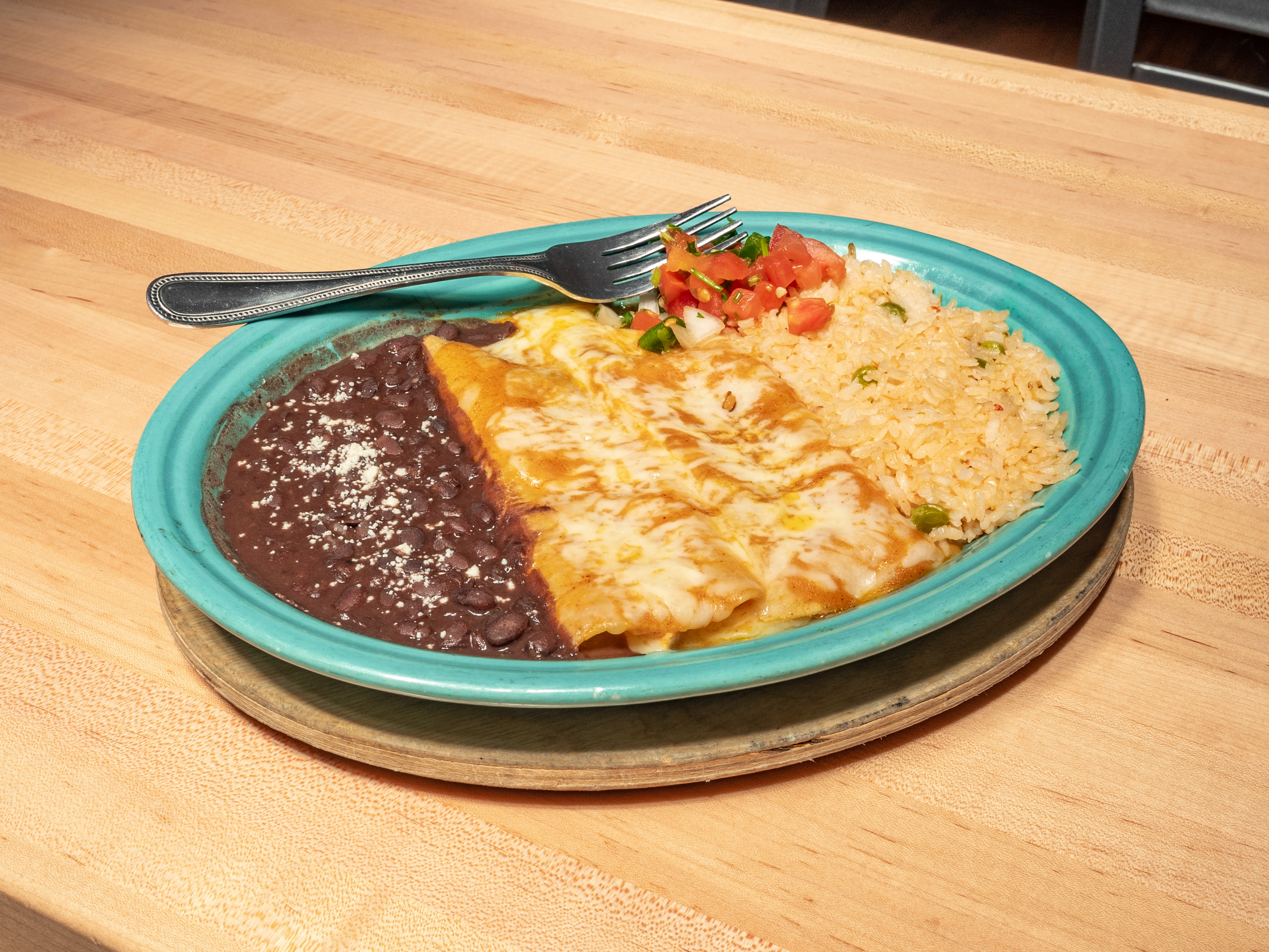 Order Sauteed Chicken Enchiladas food online from The Rio Grande Mexican Restaurant store, Lone Tree on bringmethat.com