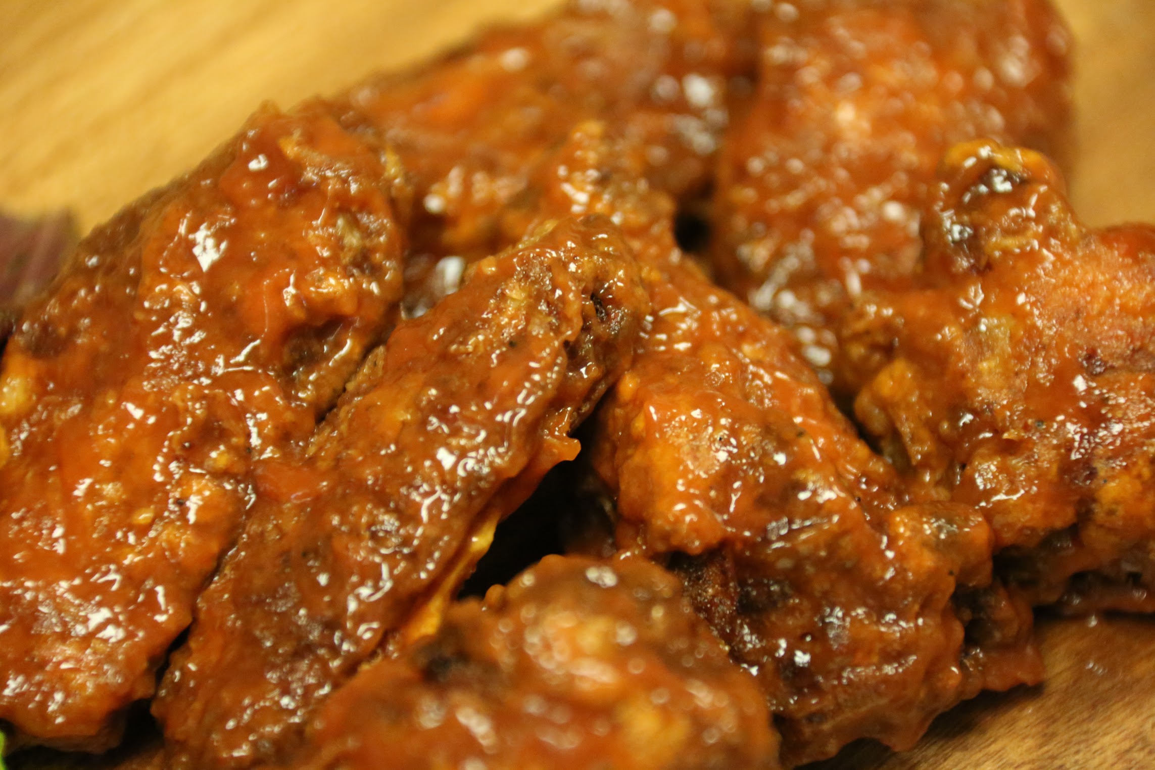 Order Medium Sizzlin' Wings food online from The Burger Joint store, New York on bringmethat.com