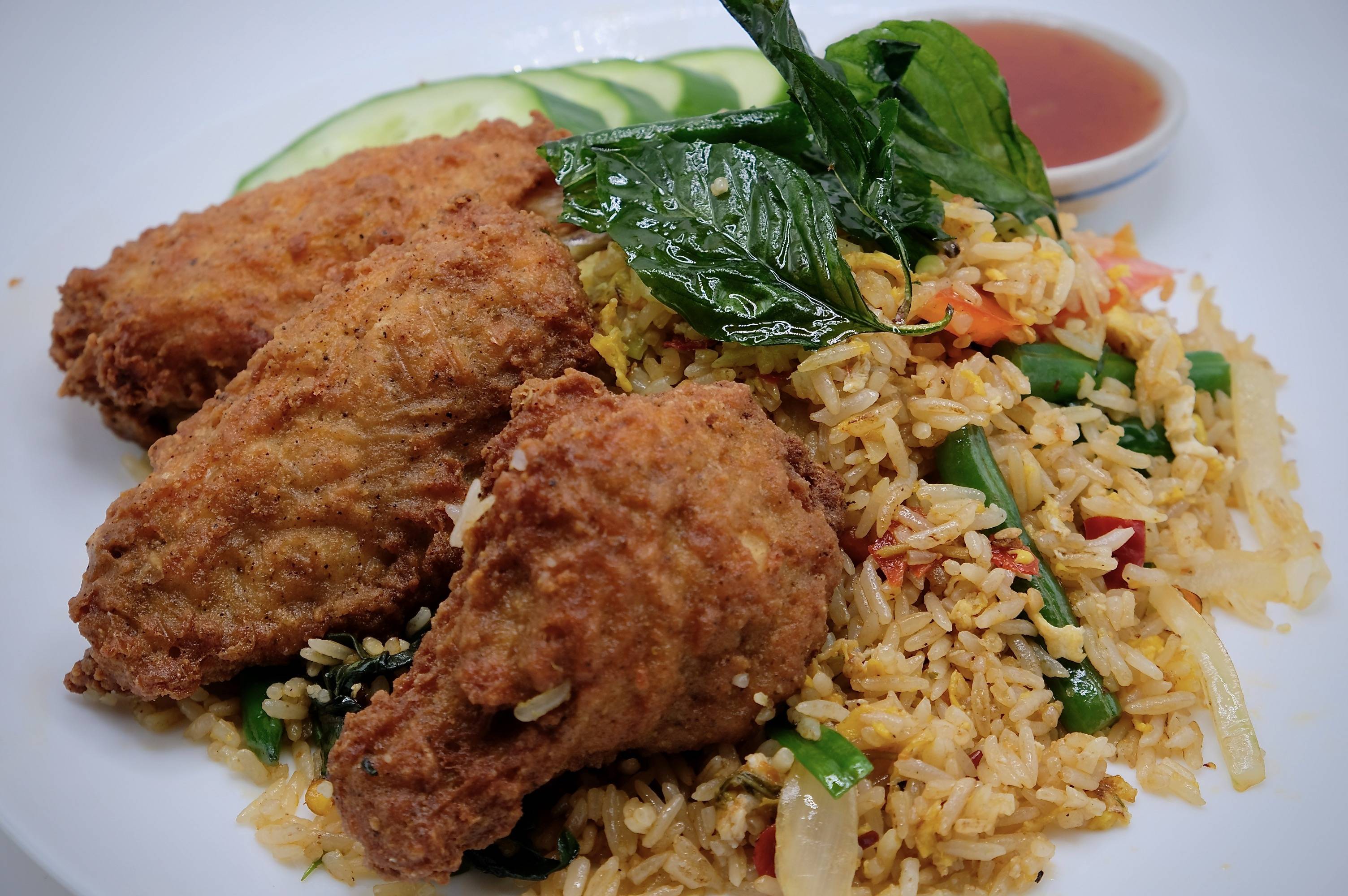 Order Basil Fried Rice with special sauce of Chicken Wings / Tenders Chicken food online from Pro thai store, New York on bringmethat.com