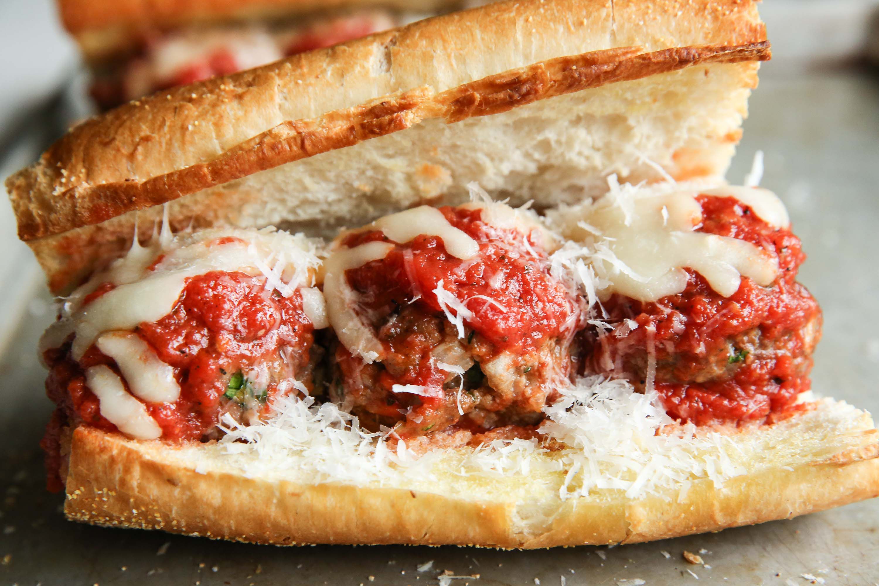 Order Meatball Parmigiana Sub food online from Dino's store, Albany on bringmethat.com