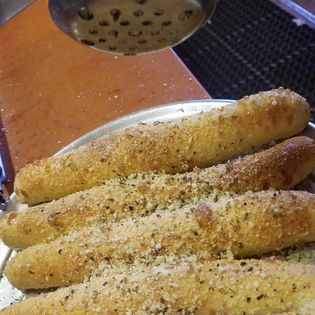 Order Regular Bread Sticks food online from Pisanellos Pizza store, Bowling Green on bringmethat.com