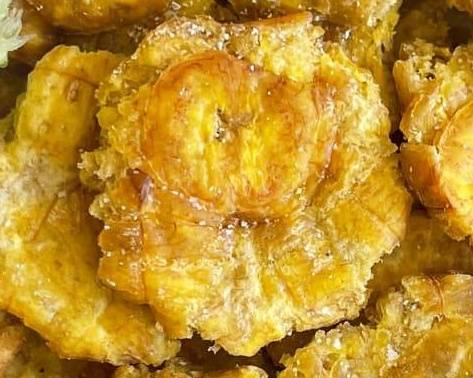 Order FRIED GREEN PLANTAINS� (TOSTONES) food online from Johns Fried Chicken store, Paramus on bringmethat.com