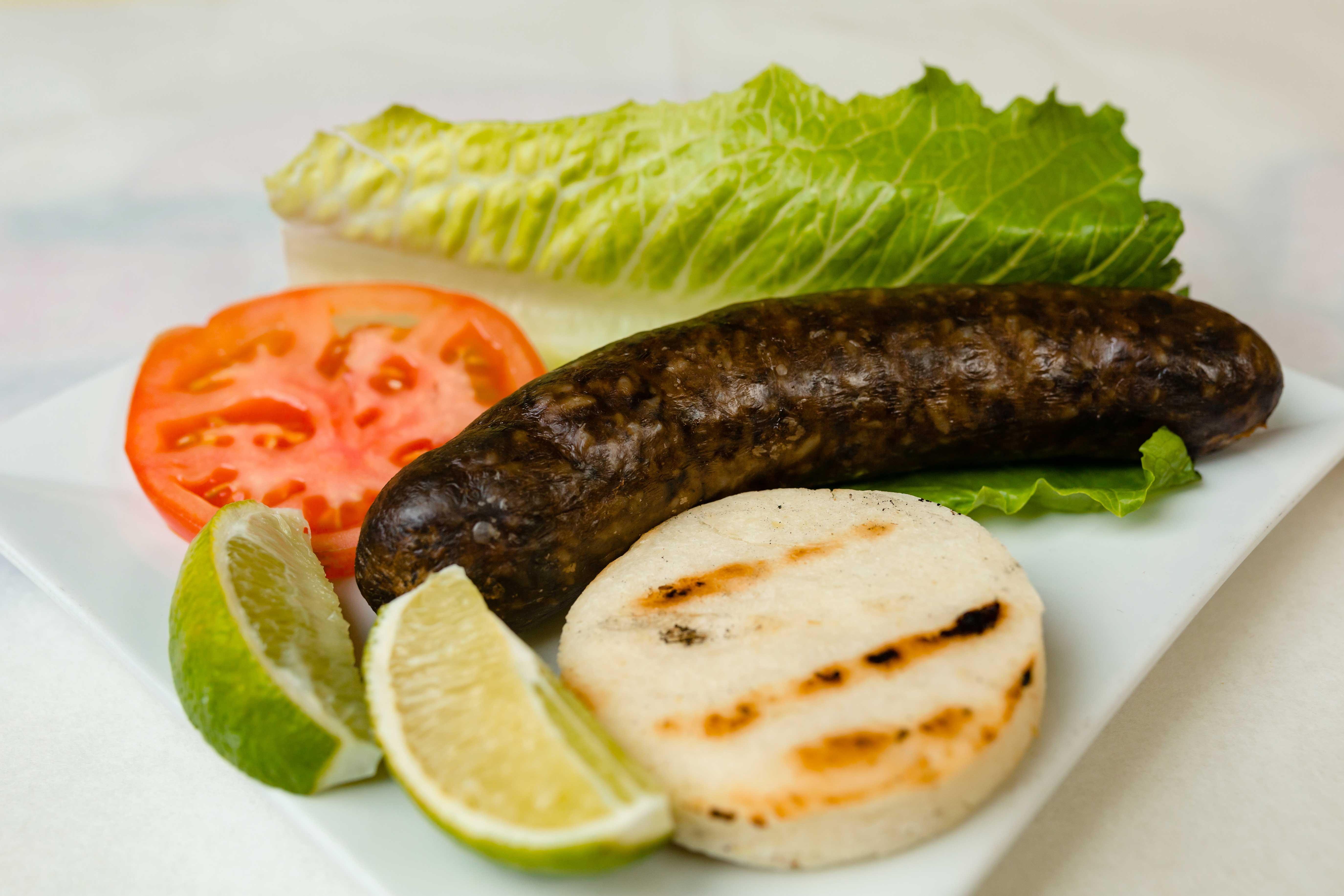 Order Morcilla con Arepa food online from El Cafetero Restaurant store, White Plains on bringmethat.com