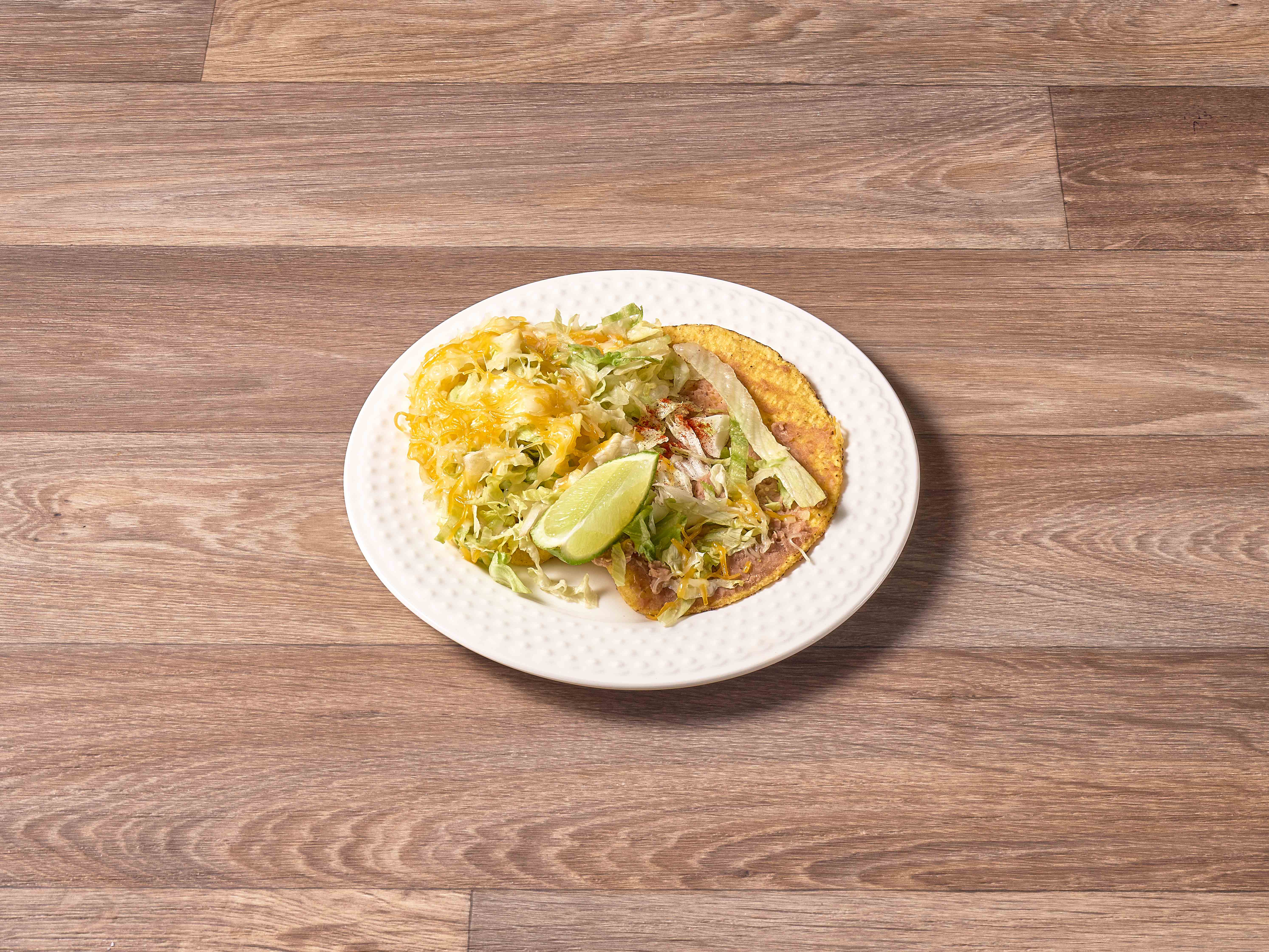 Order Tostada Cheese and Bean food online from Jesus Mexican Taqueria store, Aurora on bringmethat.com