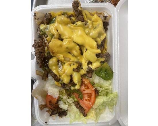 Order Philly Steak Over Rice food online from Kennedy Fried Chicken store, Monticello on bringmethat.com